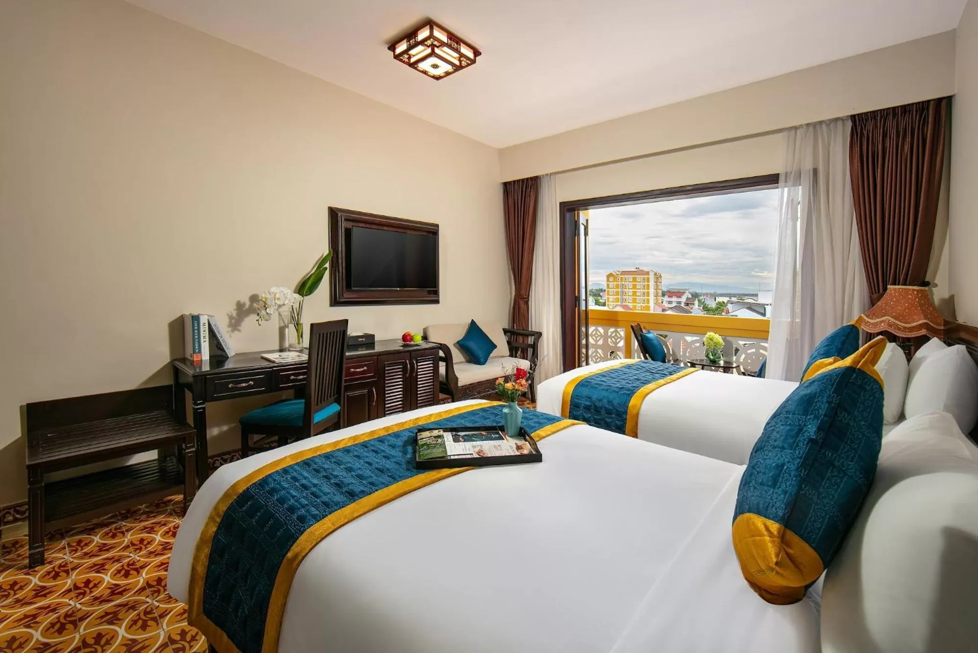 Bed in La Charm Hoi An Hotel & Spa