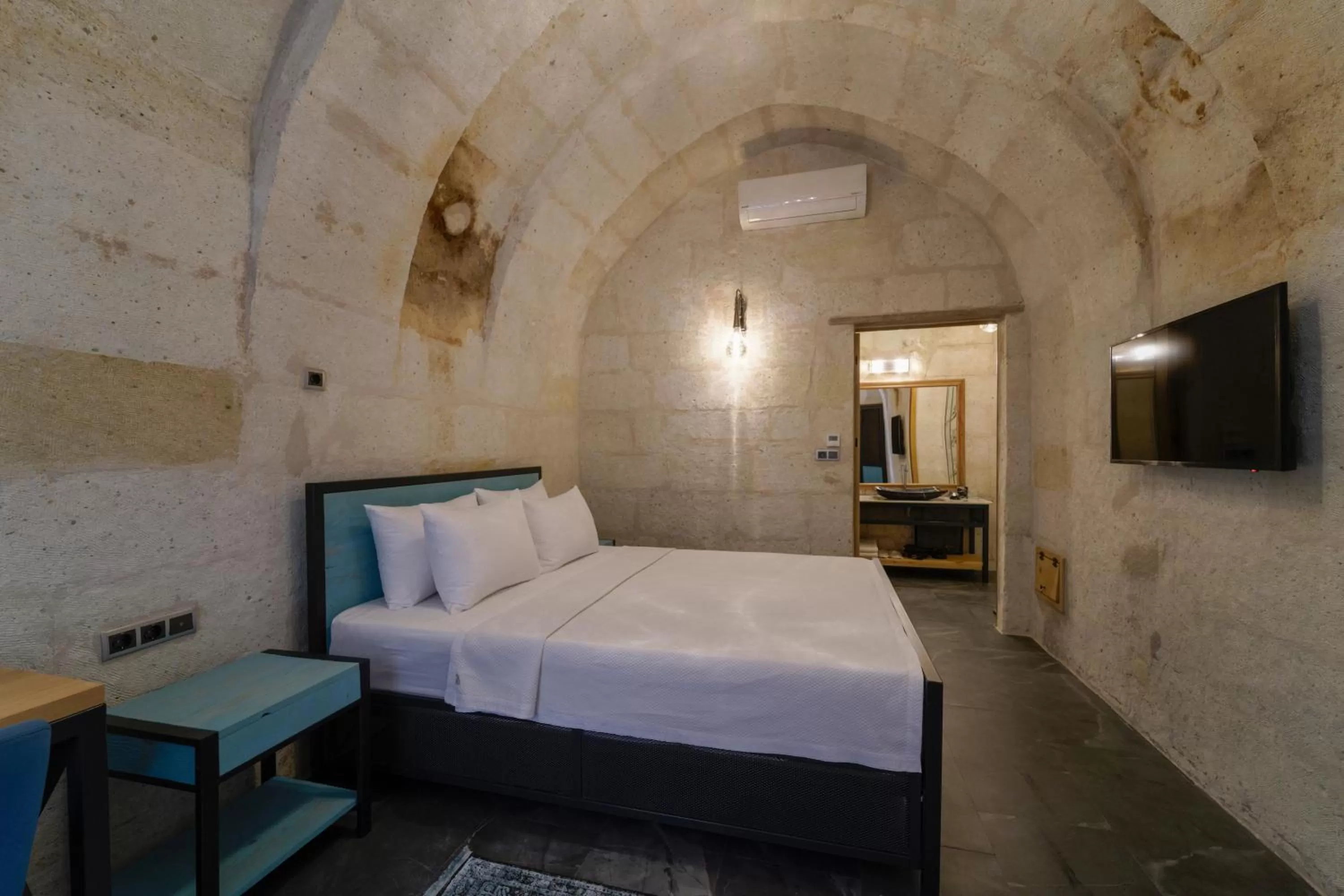 Bed in The Niche Cave Hotel