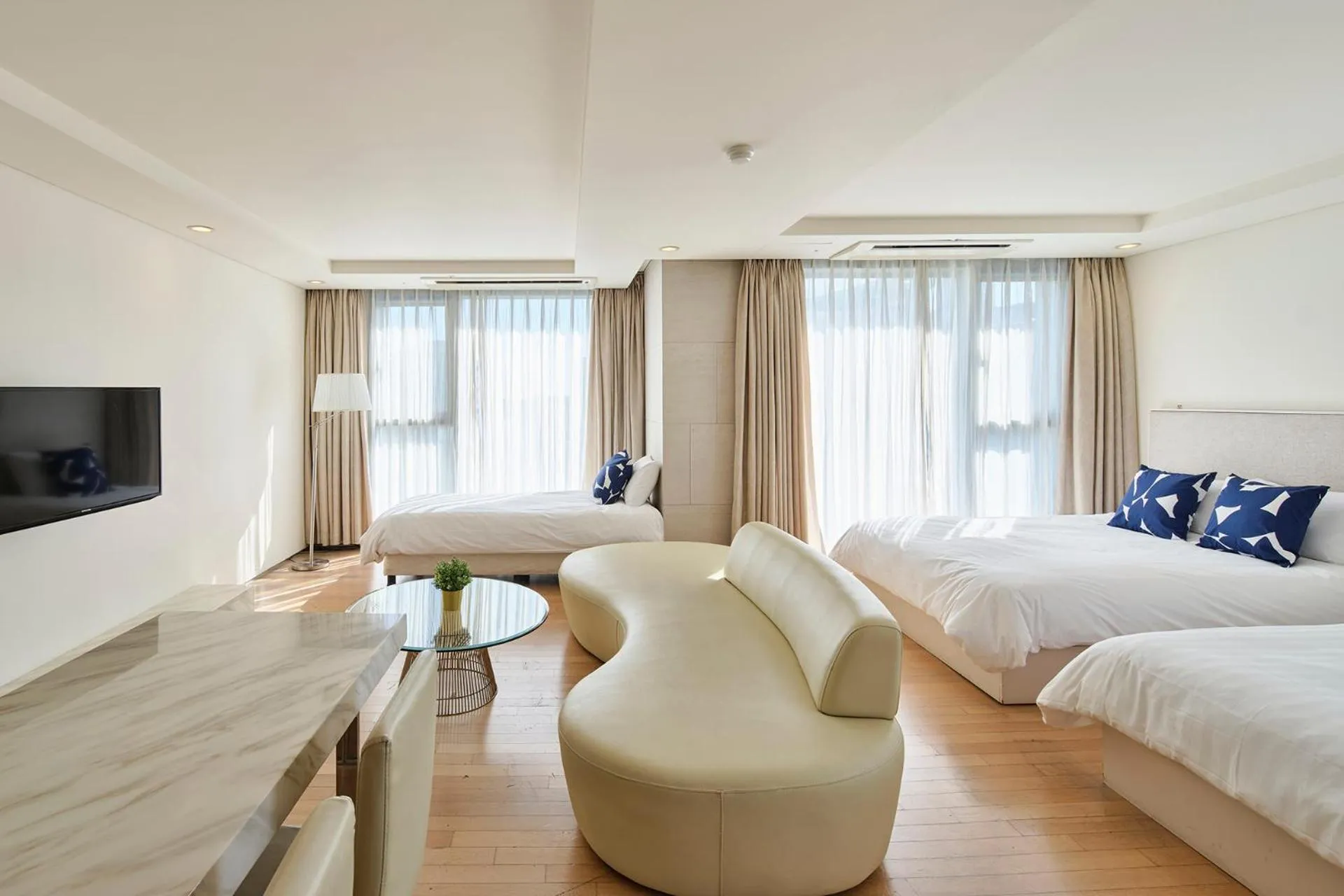 Bed in The Island Blue Hotel