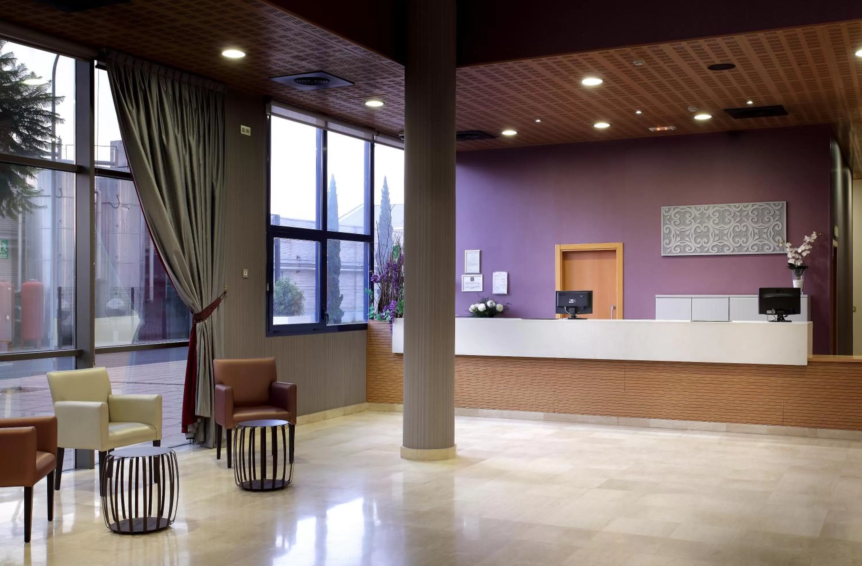 Lobby or reception in Exe Sevilla Palmera