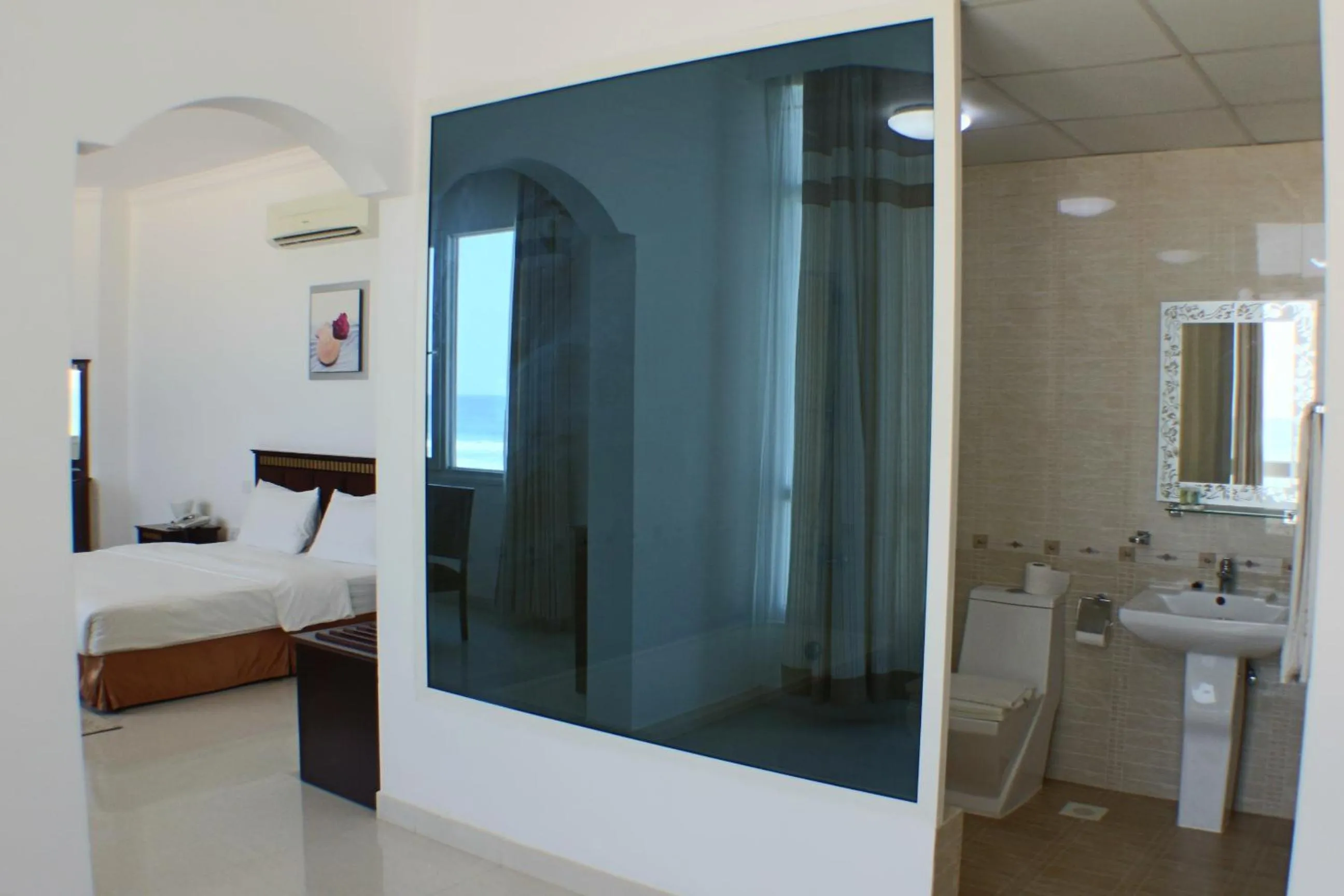 Bathroom, Bed in Beach Resort Salalah