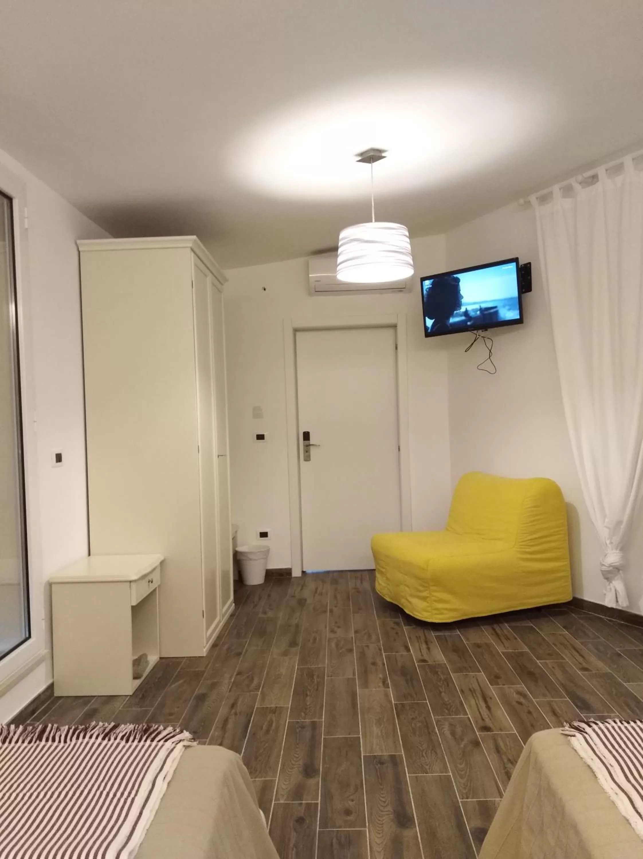 Photo of the whole room in DomuS al Corso B&B