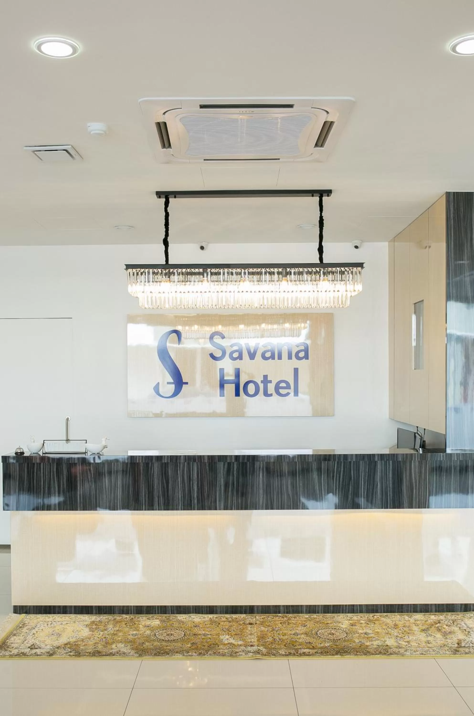 Property logo or sign in Savana Hotel & Serviced Apartments