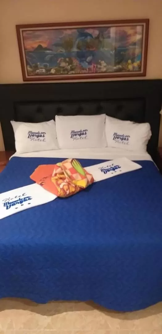 Bed in HOTEL MUEVETE POR VARGAS