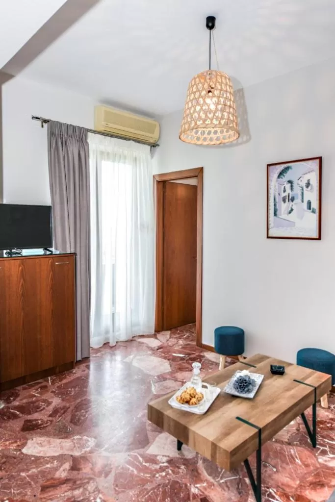 TV and multimedia in V & G Cozy Apartments