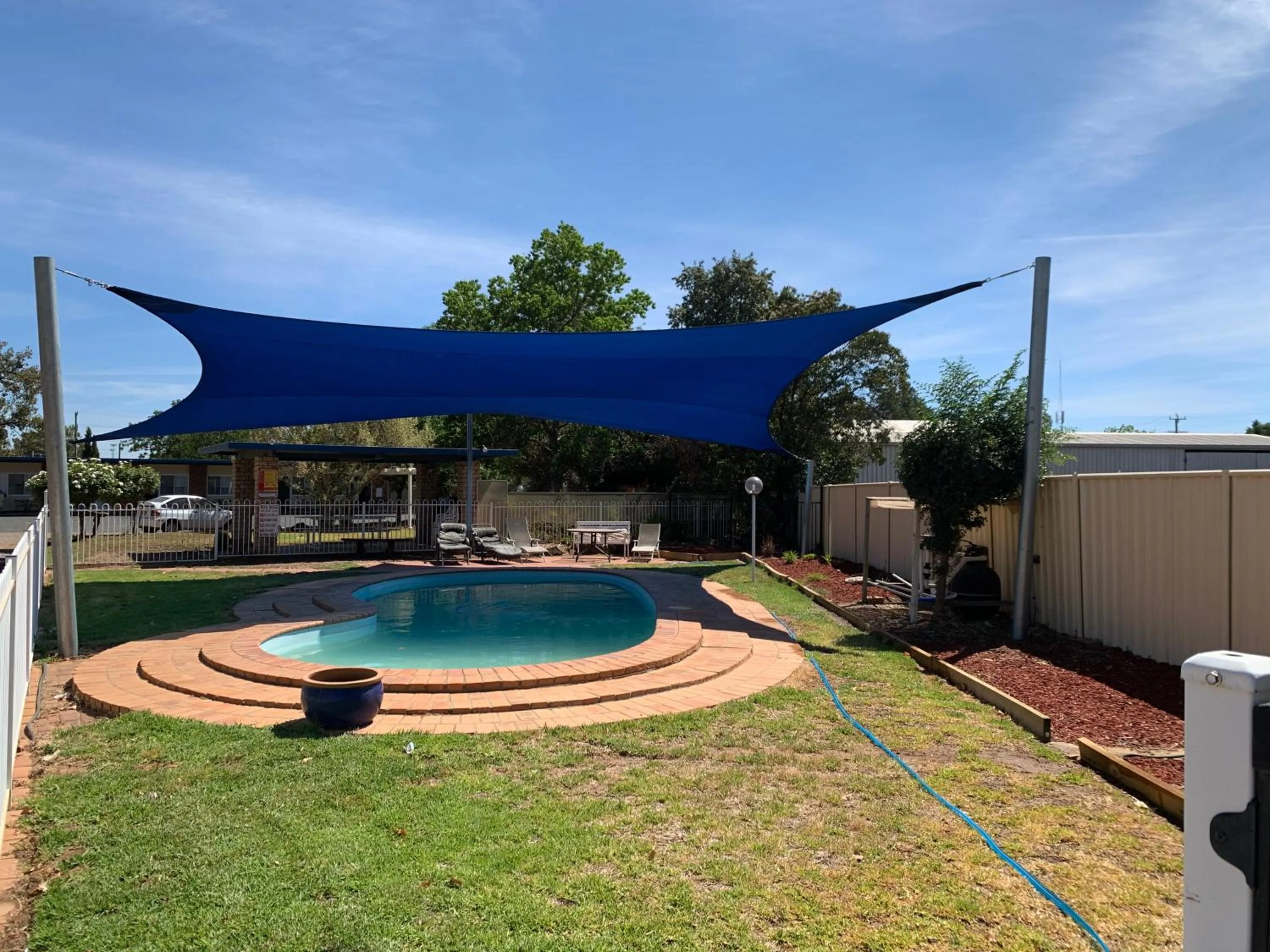 Swimming pool in Orana Windmill Motel
