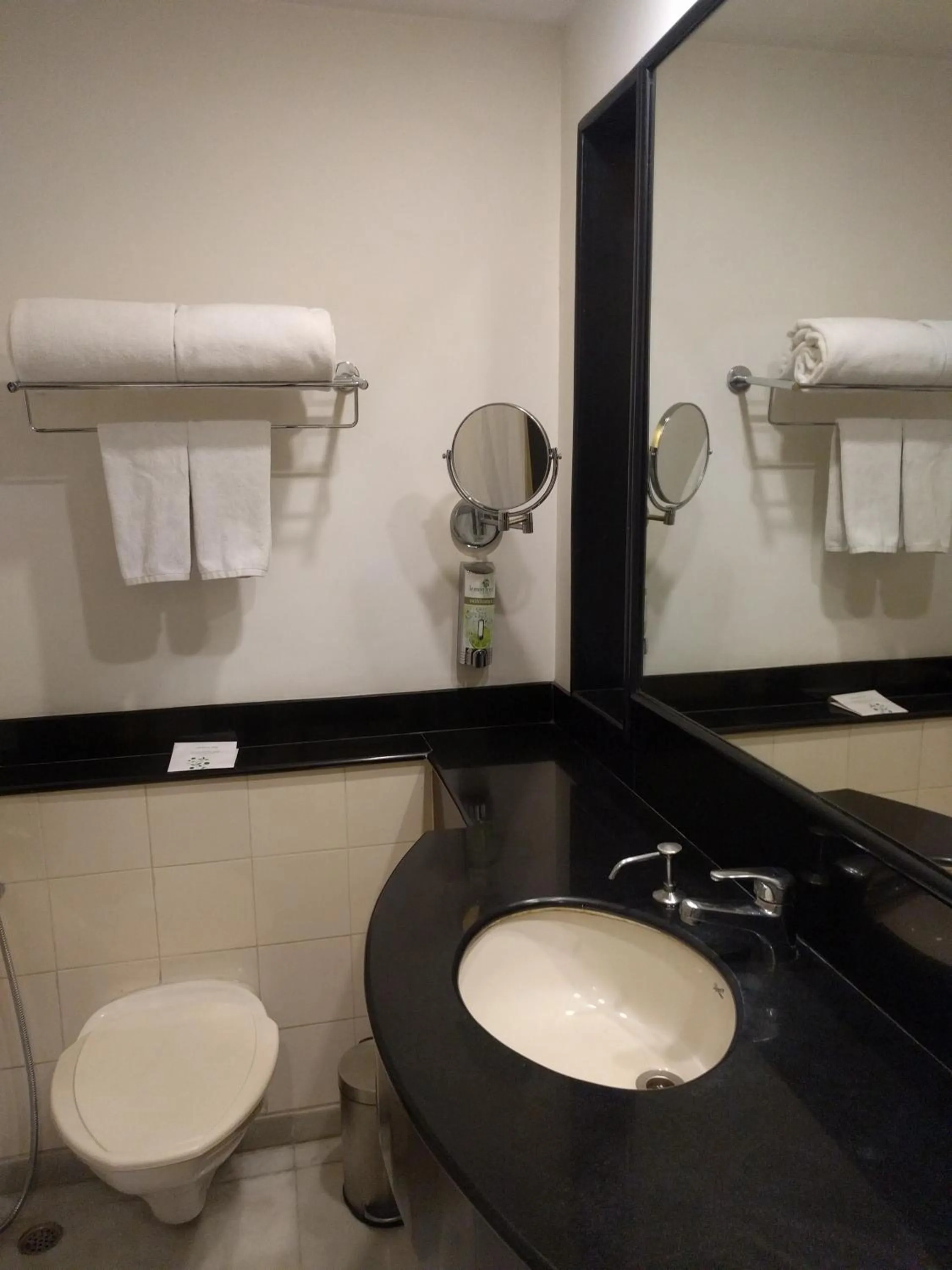 Bathroom in Lemon Tree Hotel, Udyog Vihar, Gurugram