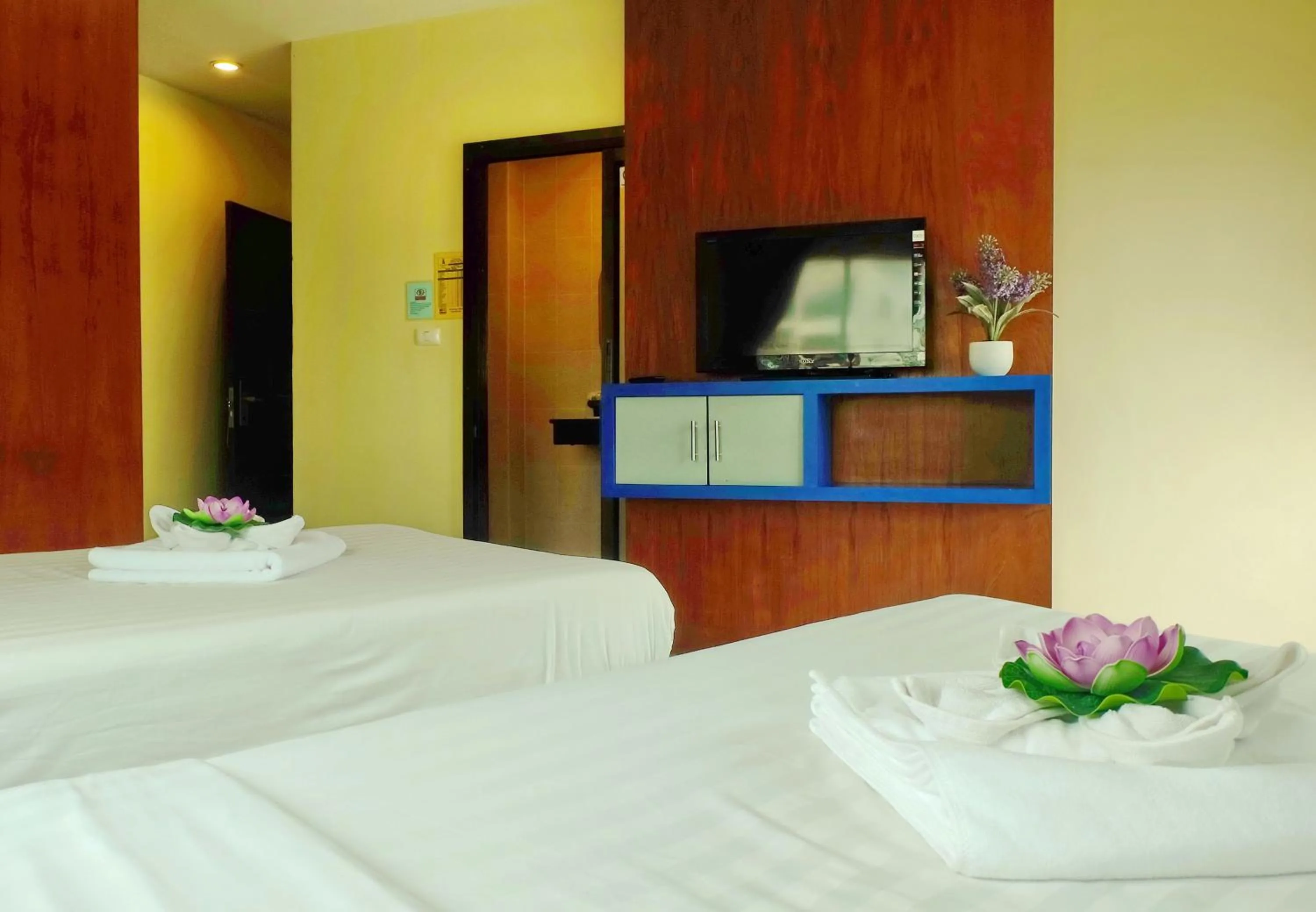 Bed in Calypso Patong Hotel
