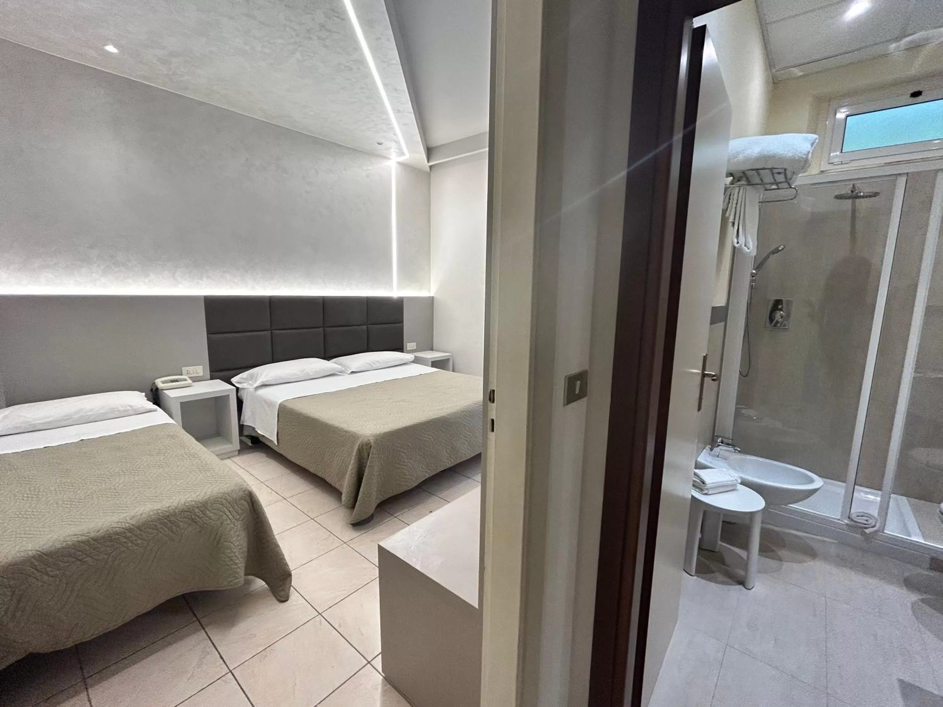 Property building, Bed in Hotel Adria