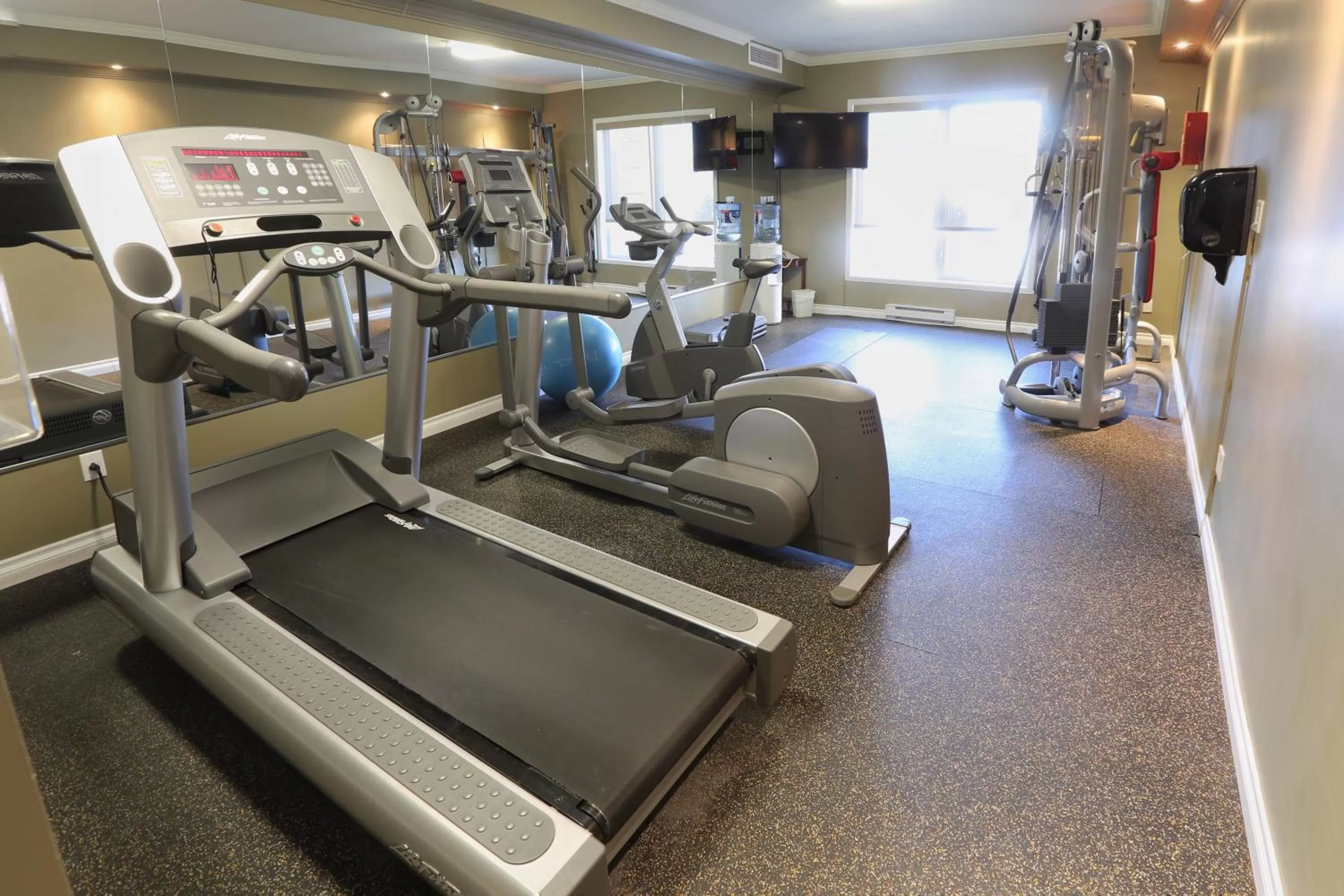 Fitness centre/facilities in Hotel Brossard