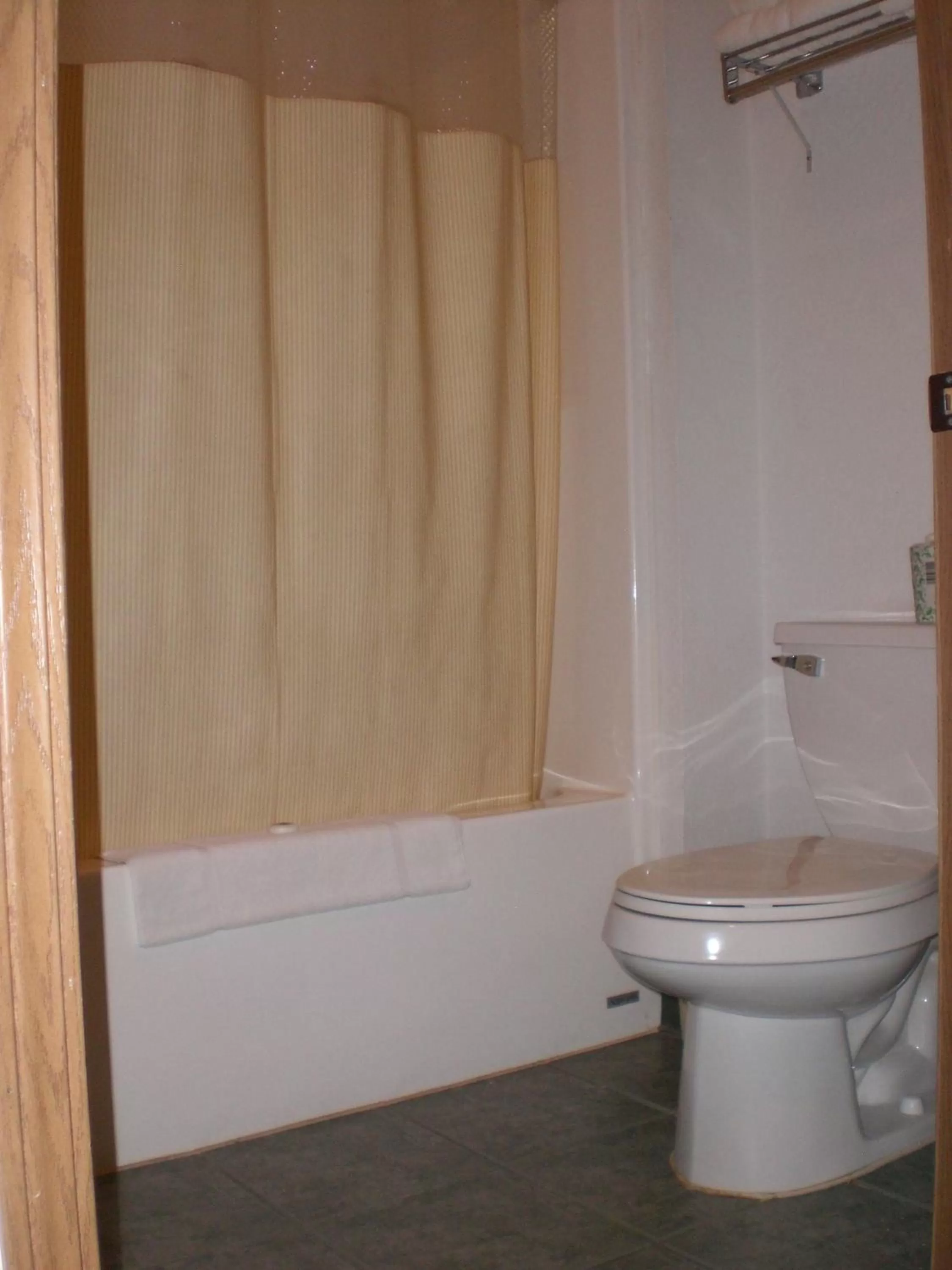 Toilet in Days Inn by Wyndham Butler