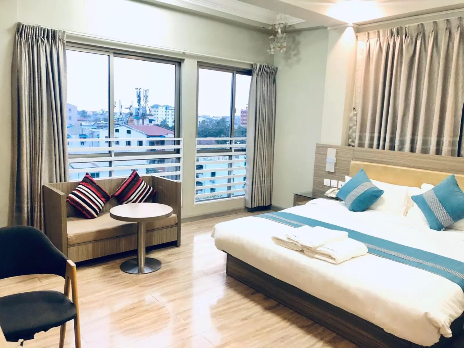 Photo of the whole room, Bed in SERENE Stays Hotel