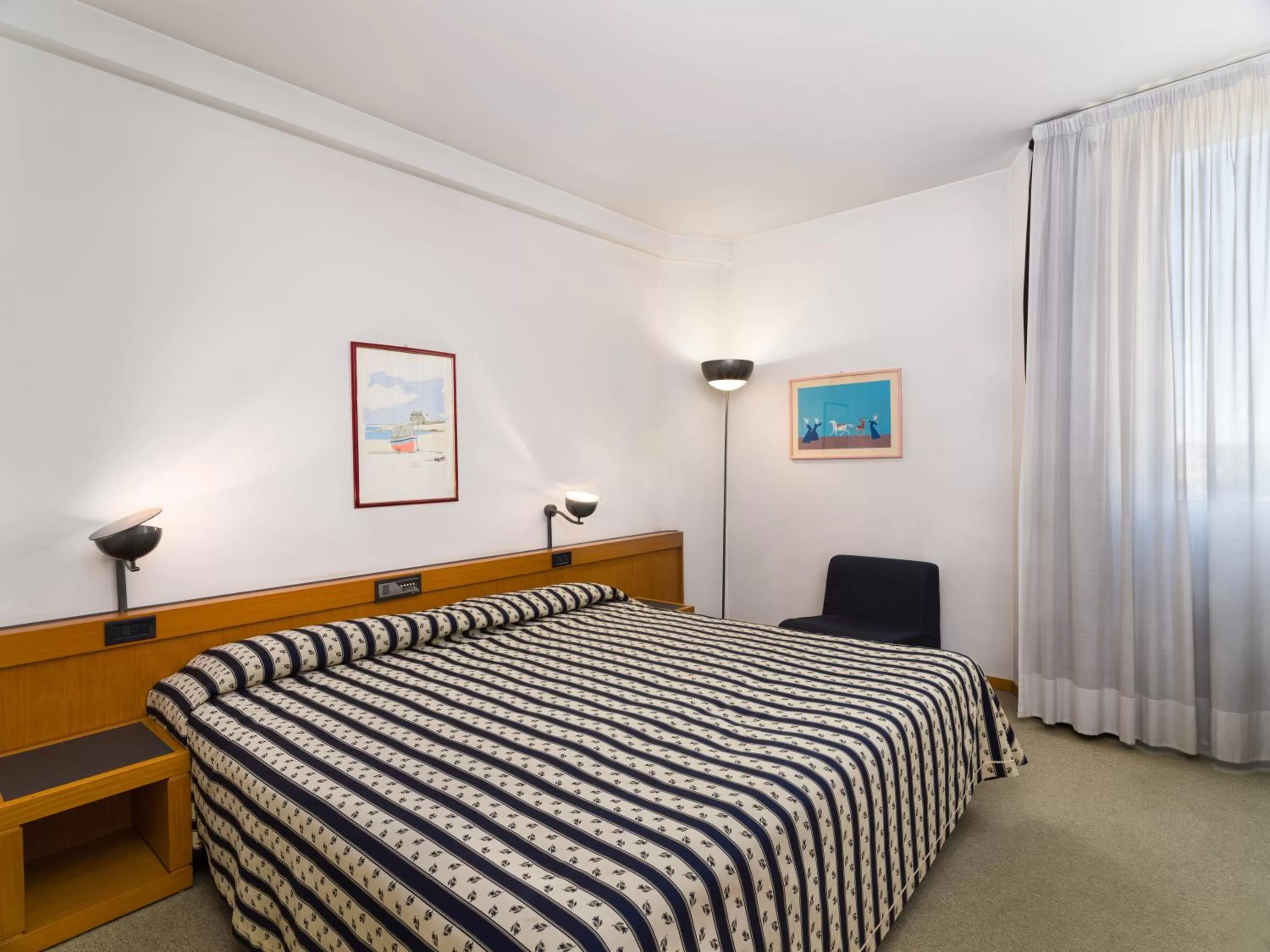 Bed in Grand Hotel Tiziano E Dei Congressi