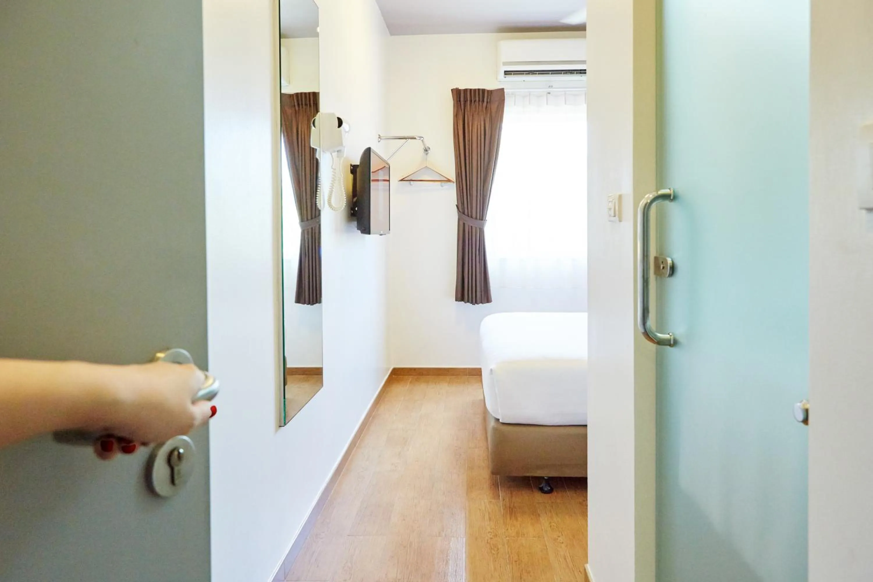 Bedroom in Easy Planet Phuket Patong