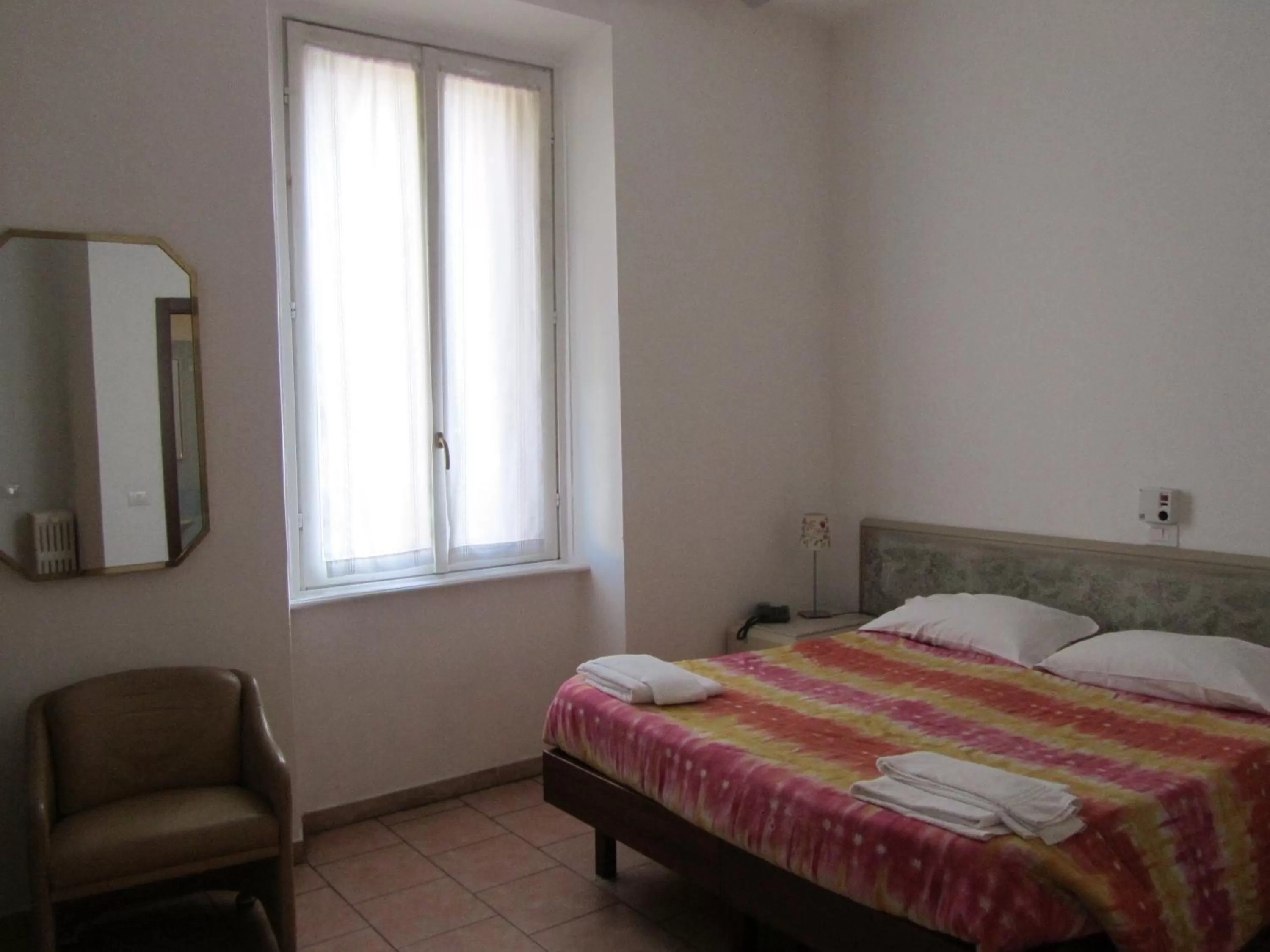 Bed in Hotel Gambara