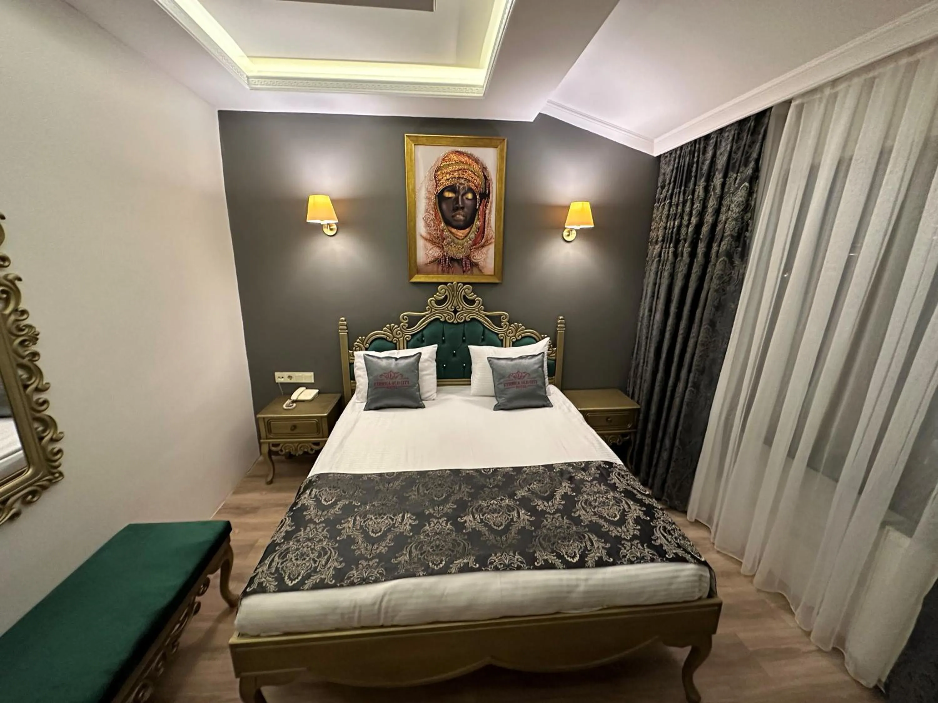 Bed in Ethnica Suites