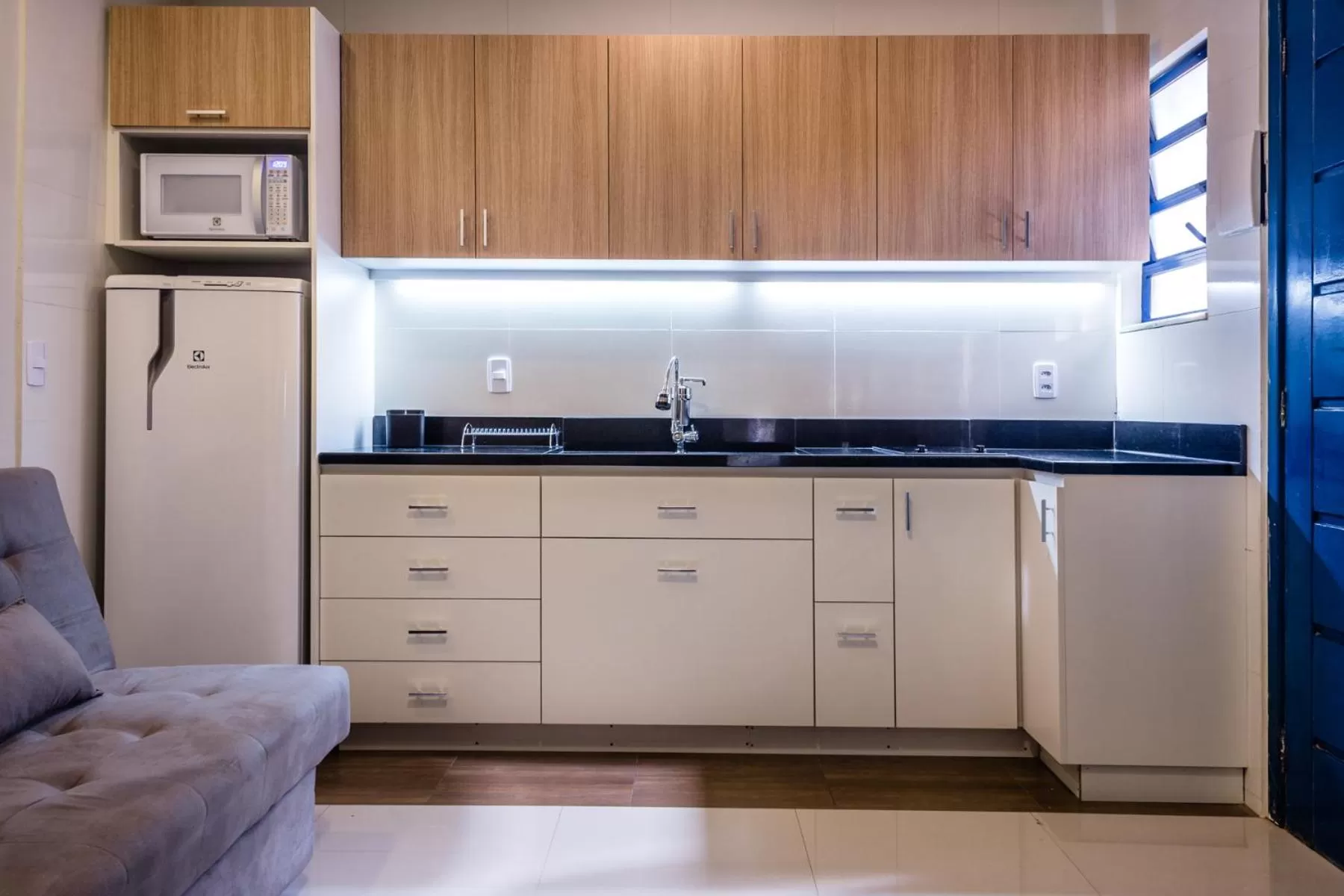 Kitchen or kitchenette, Kitchen/Kitchenette in Injoy Suítes & Aparts