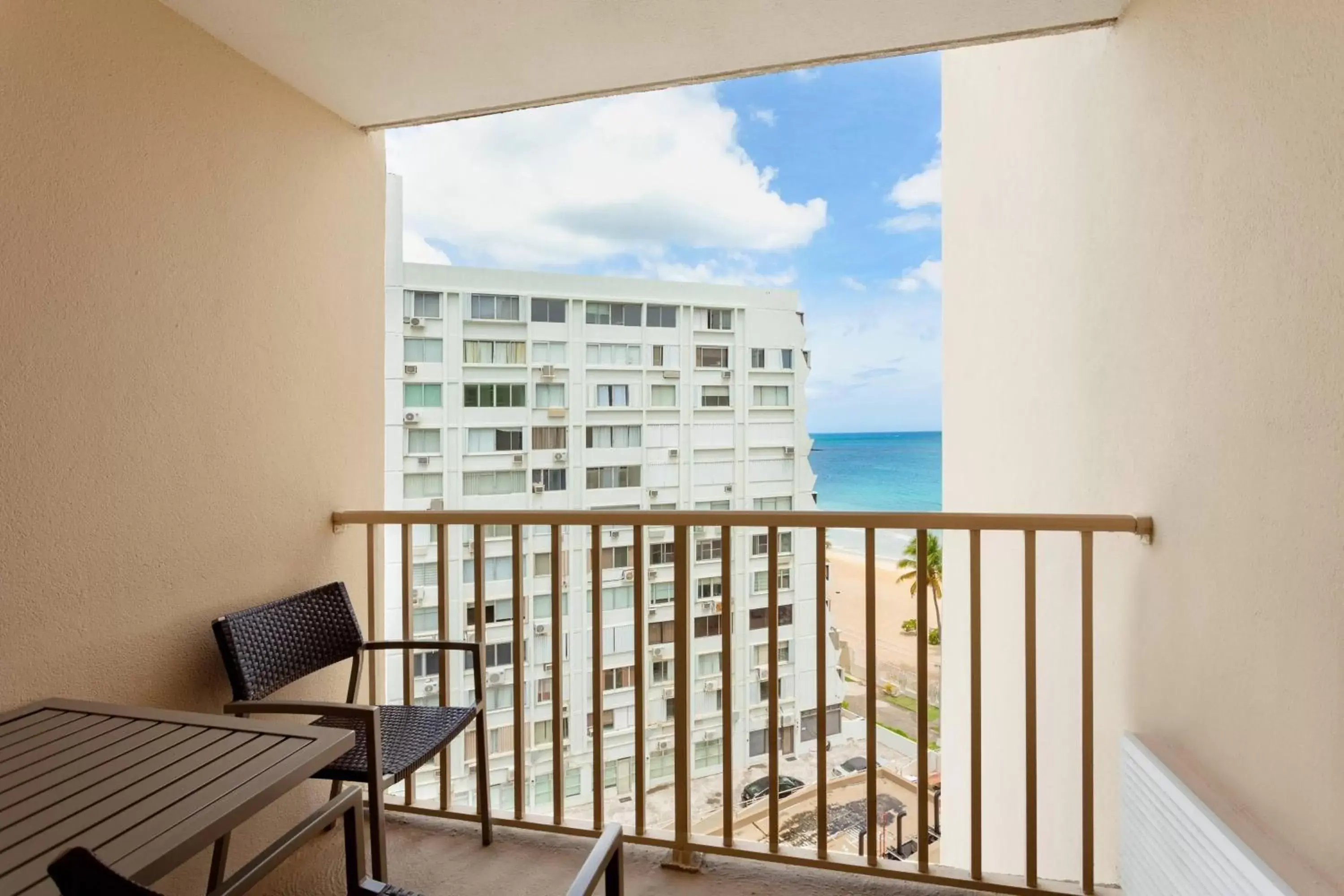 Queen Room with Two Queen Beds, Balcony and Partial Ocean View - Hearing Accessible in Courtyard by Marriott Isla Verde Beach Resort Queen Room with Two Queen Beds, Balcony and Partial Ocean View - Hearing Accessible in Courtyard by Marriott Isla Verde Beach Resort