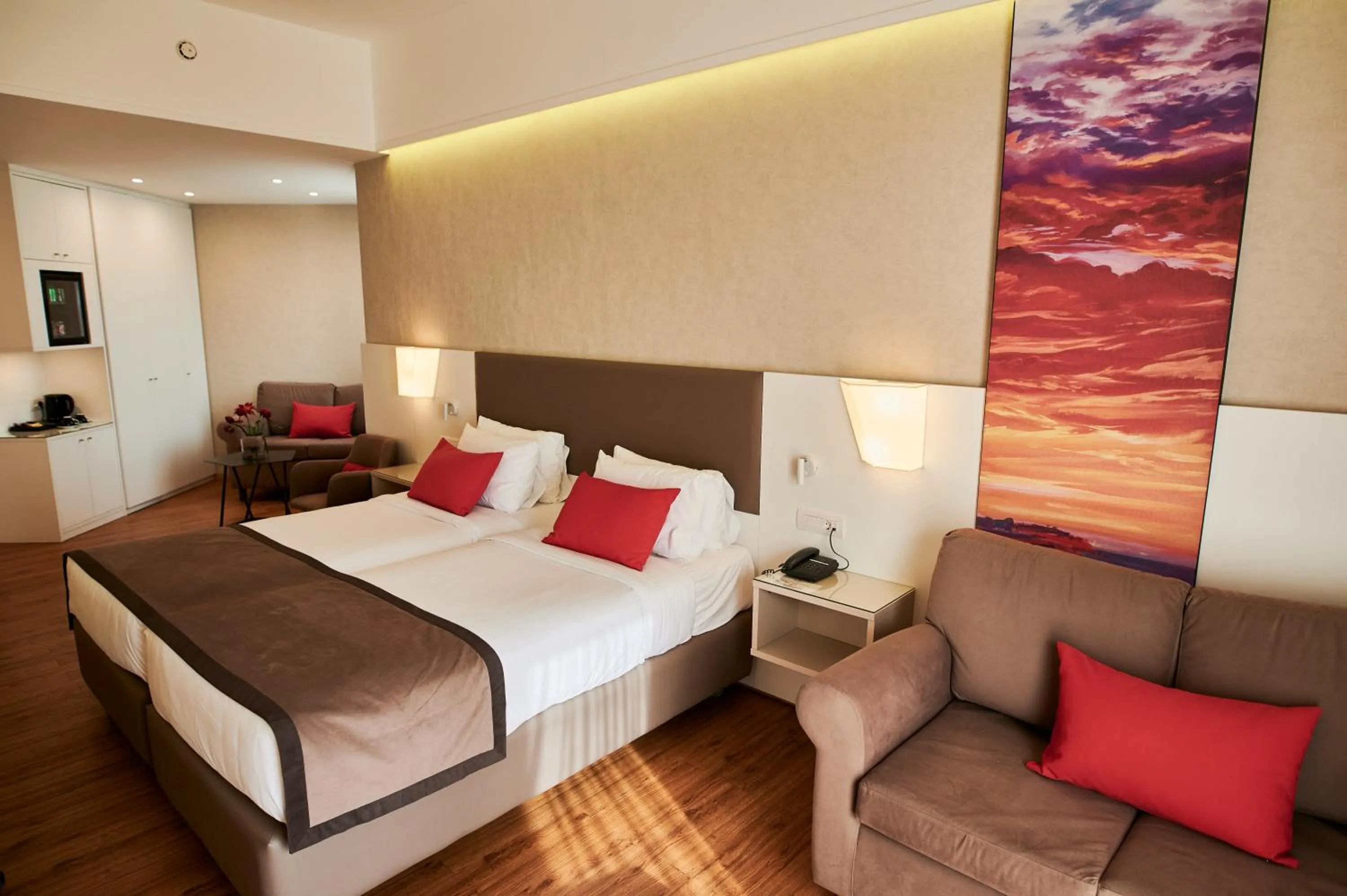 Bedroom, Bed in Ramada Plaza by Wyndham Thraki