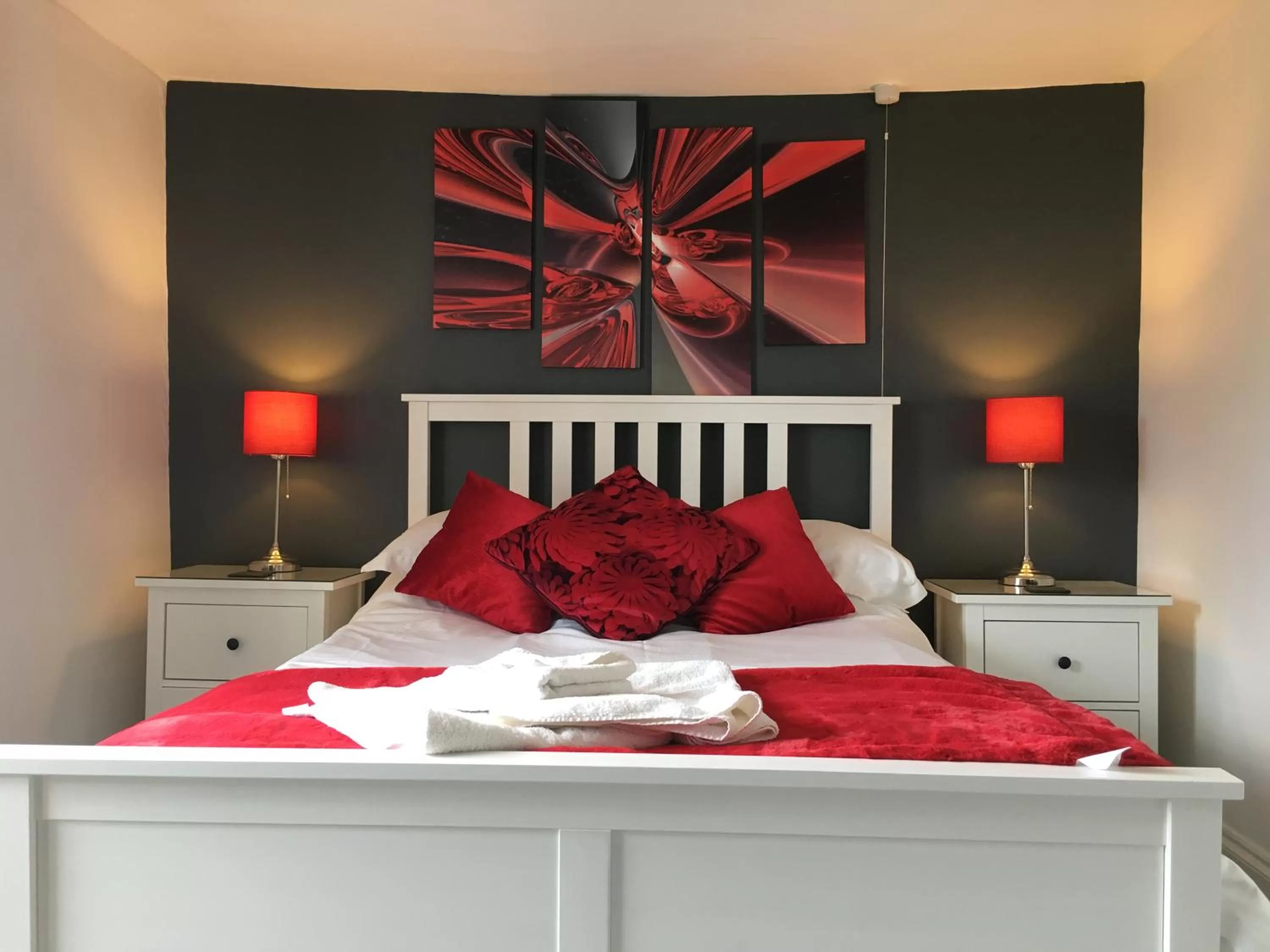 Bed in The Greyhound Inn