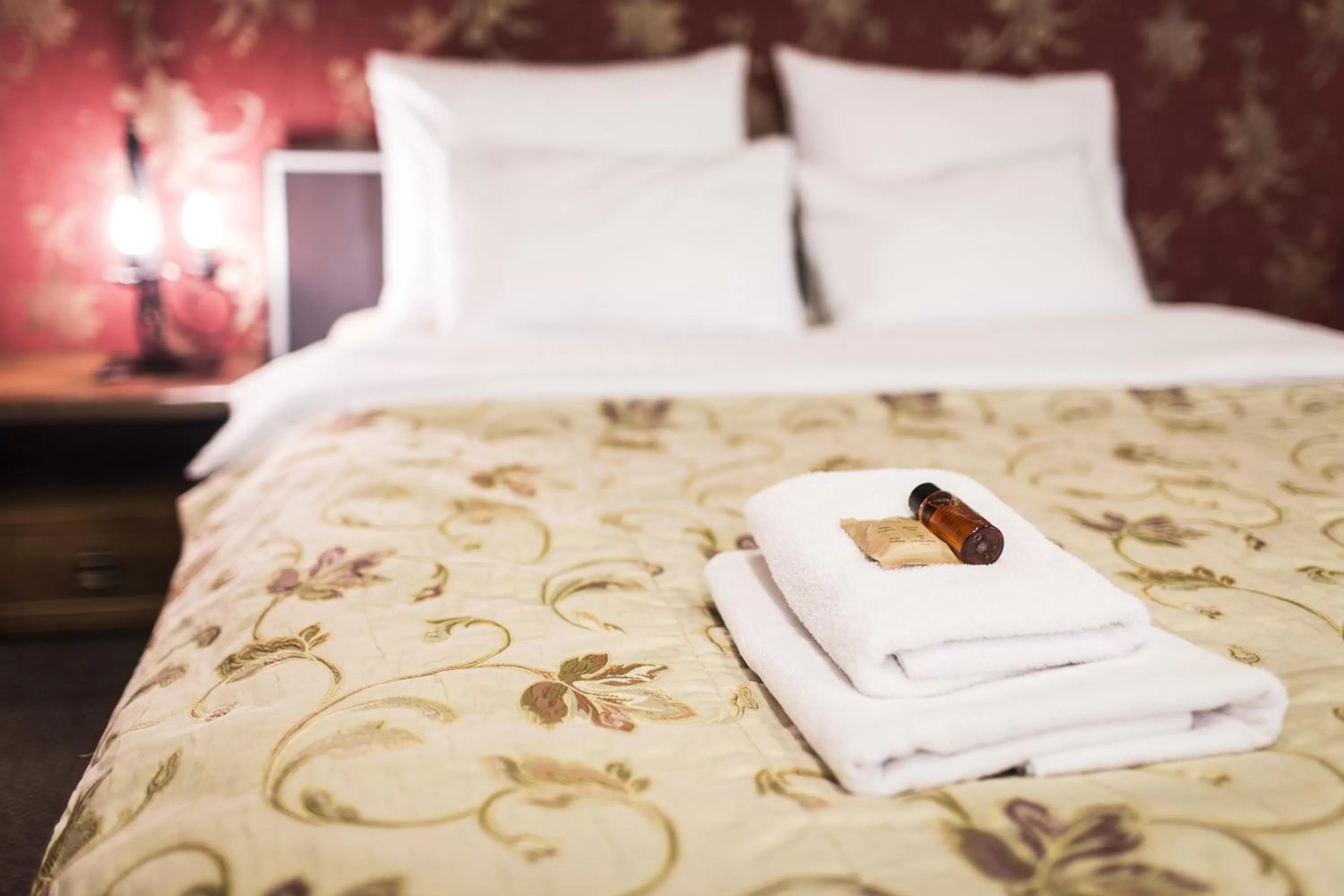 Bed in Abella Suites & Apartments by Artery Hotels