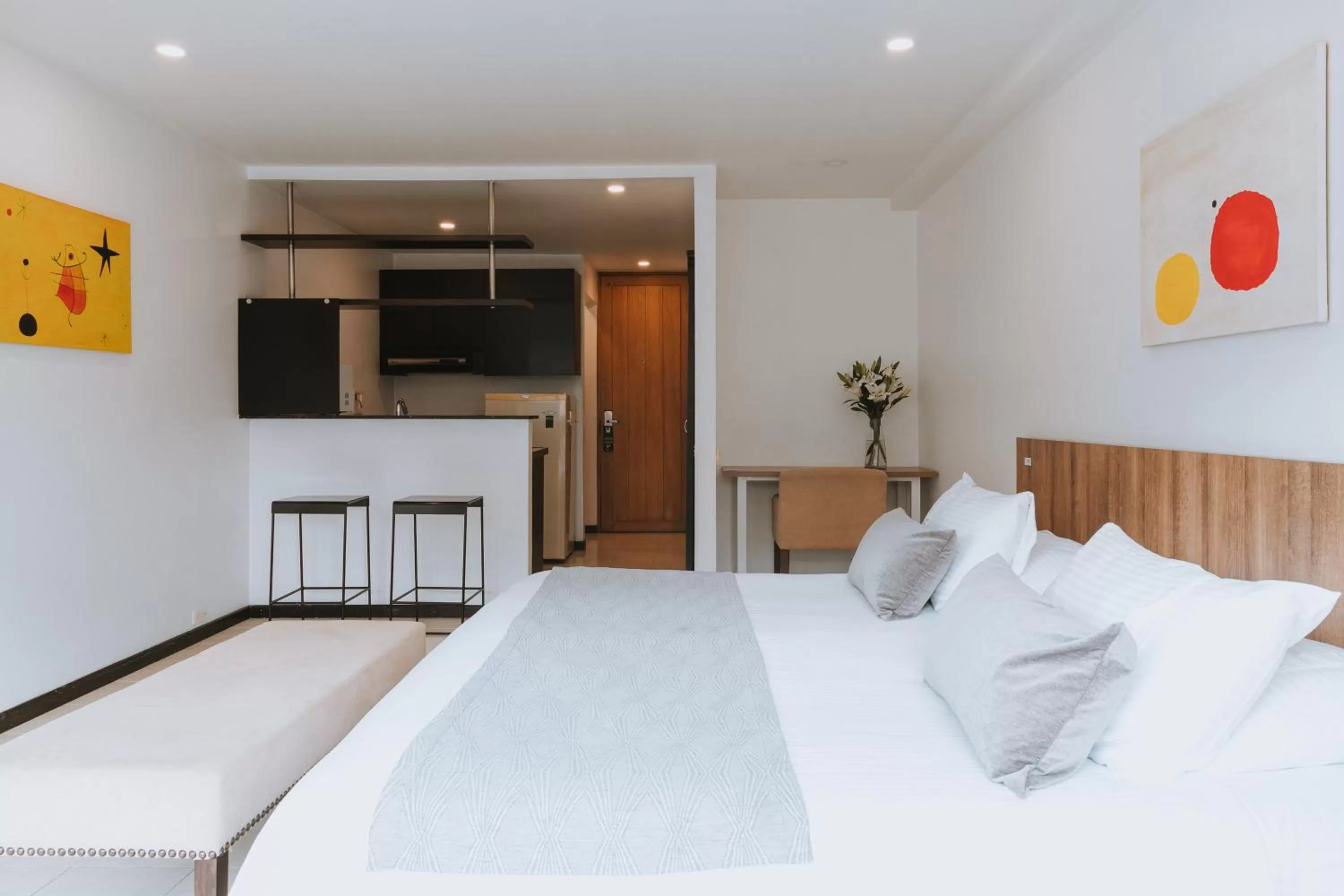 Photo of the whole room, Bed in Travelers Orange Suites