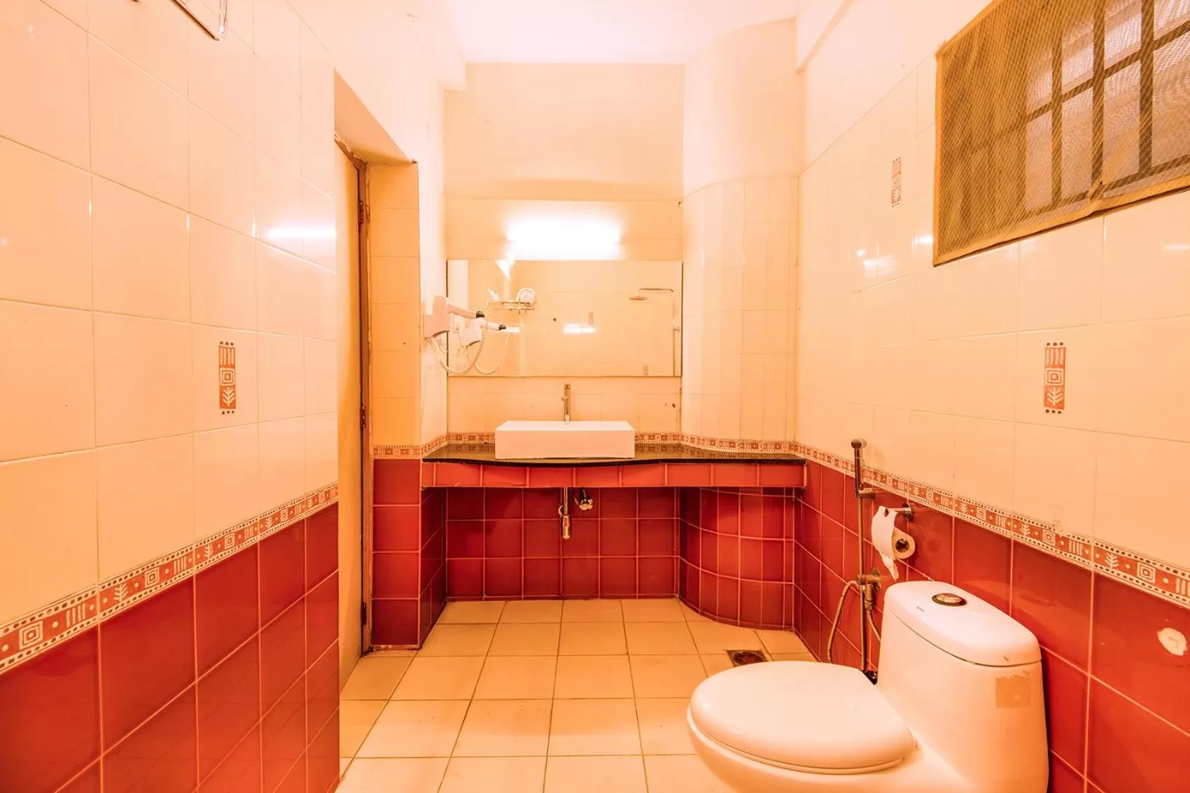 Bathroom in Fabhotel Blossoms Service Apartment - T Nagar