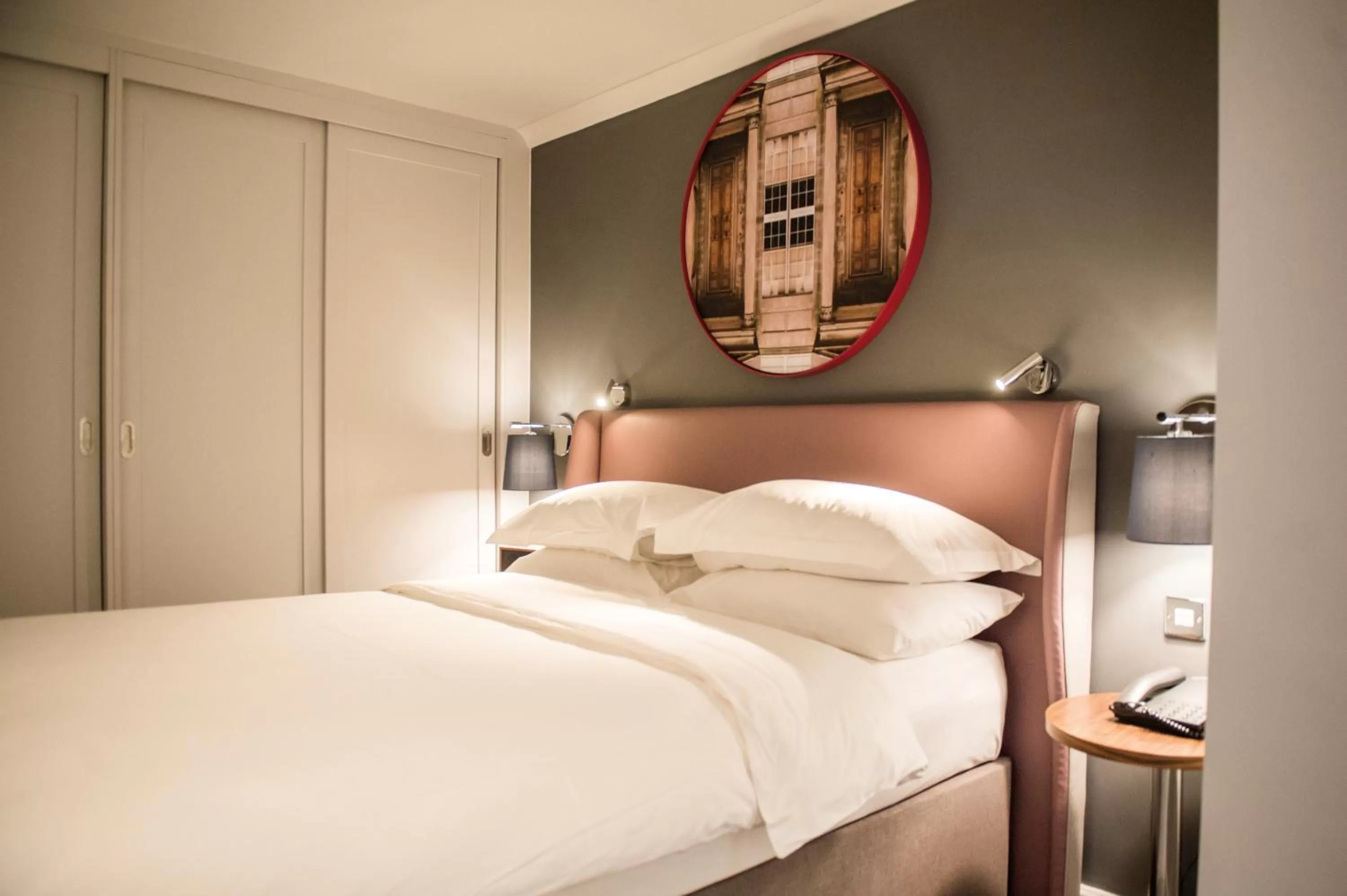 Bed in Cottons Hotel and Spa