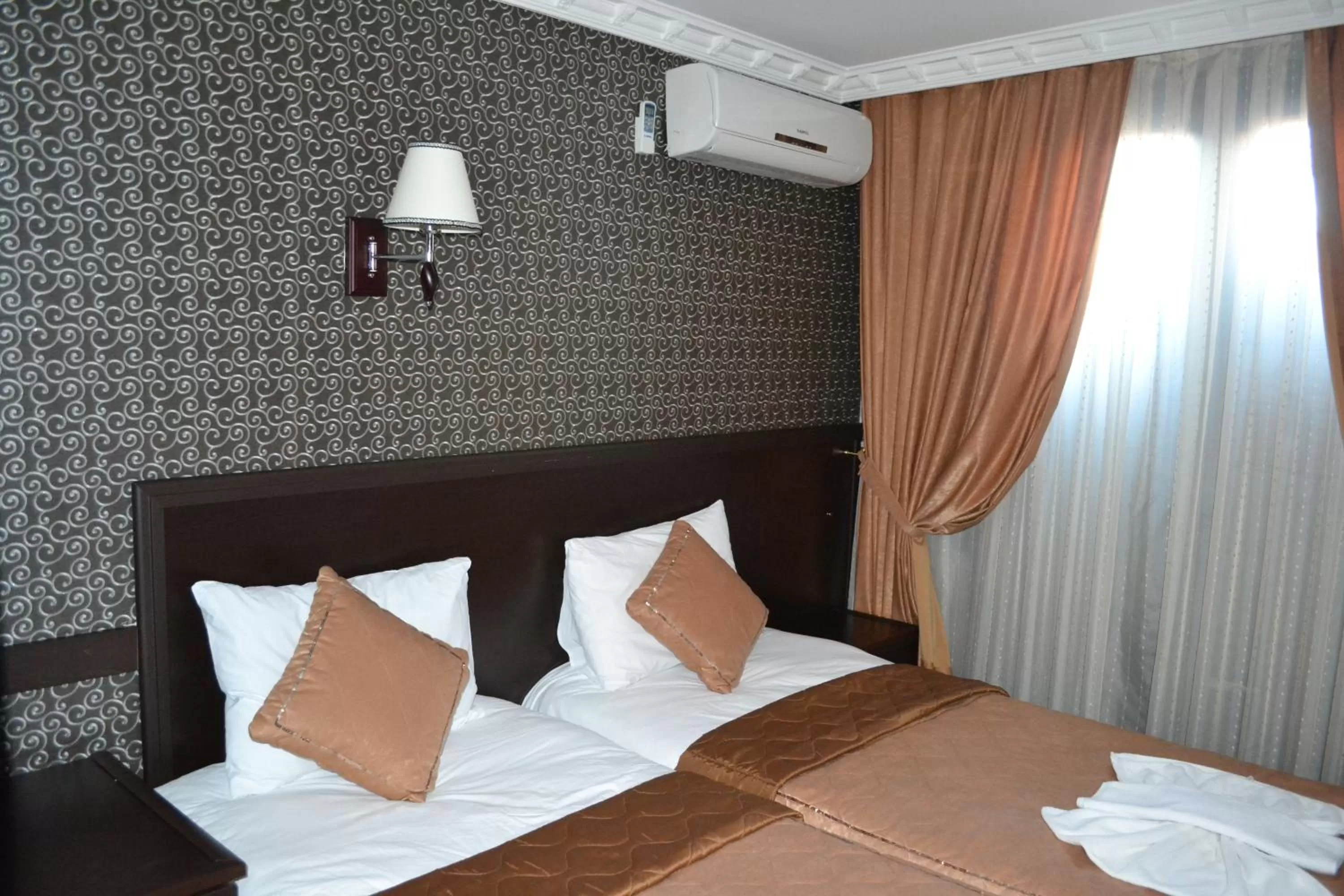 View (from property/room), Bed in Ares Hotel