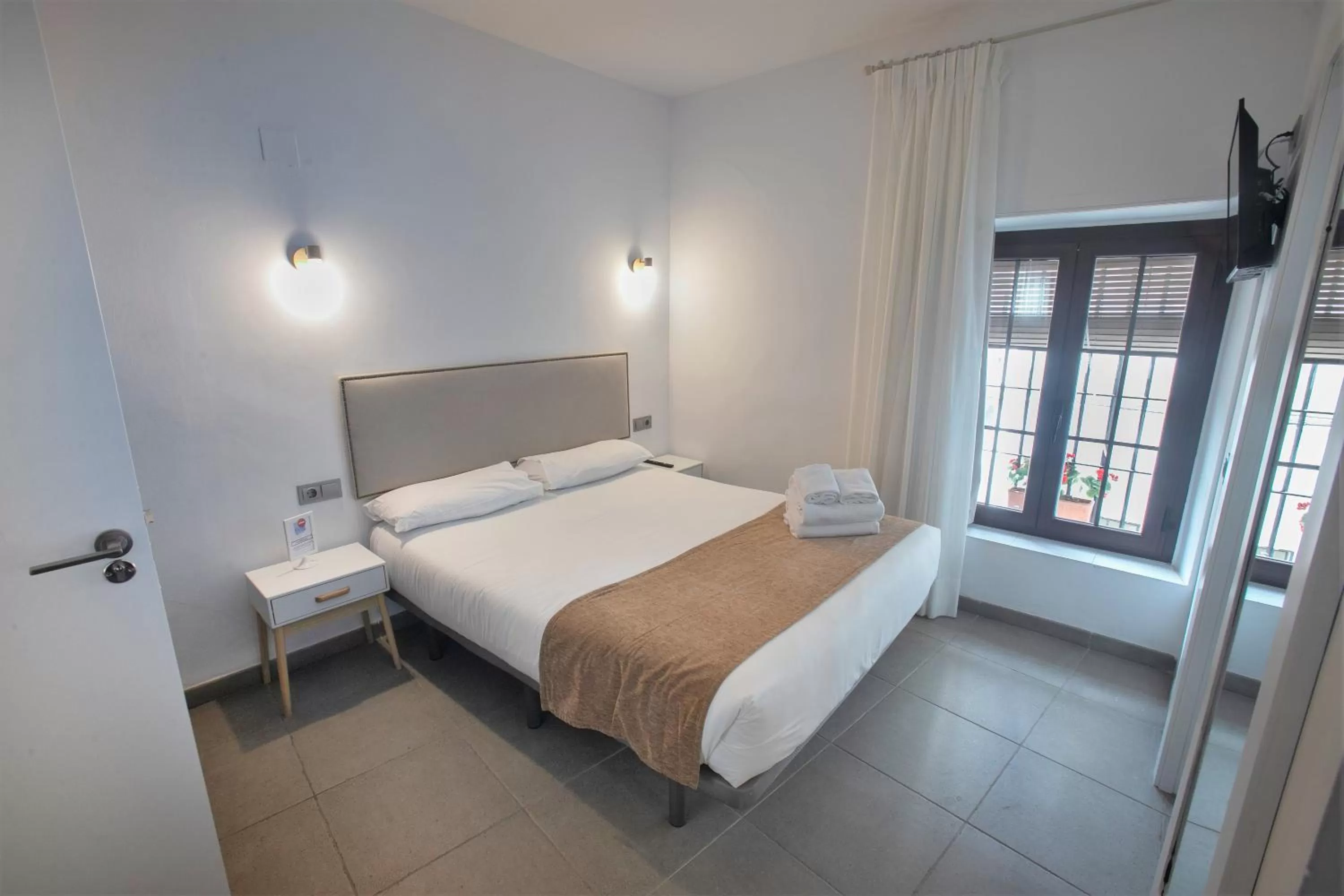 Photo of the whole room, Bed in Vitium Córdoba