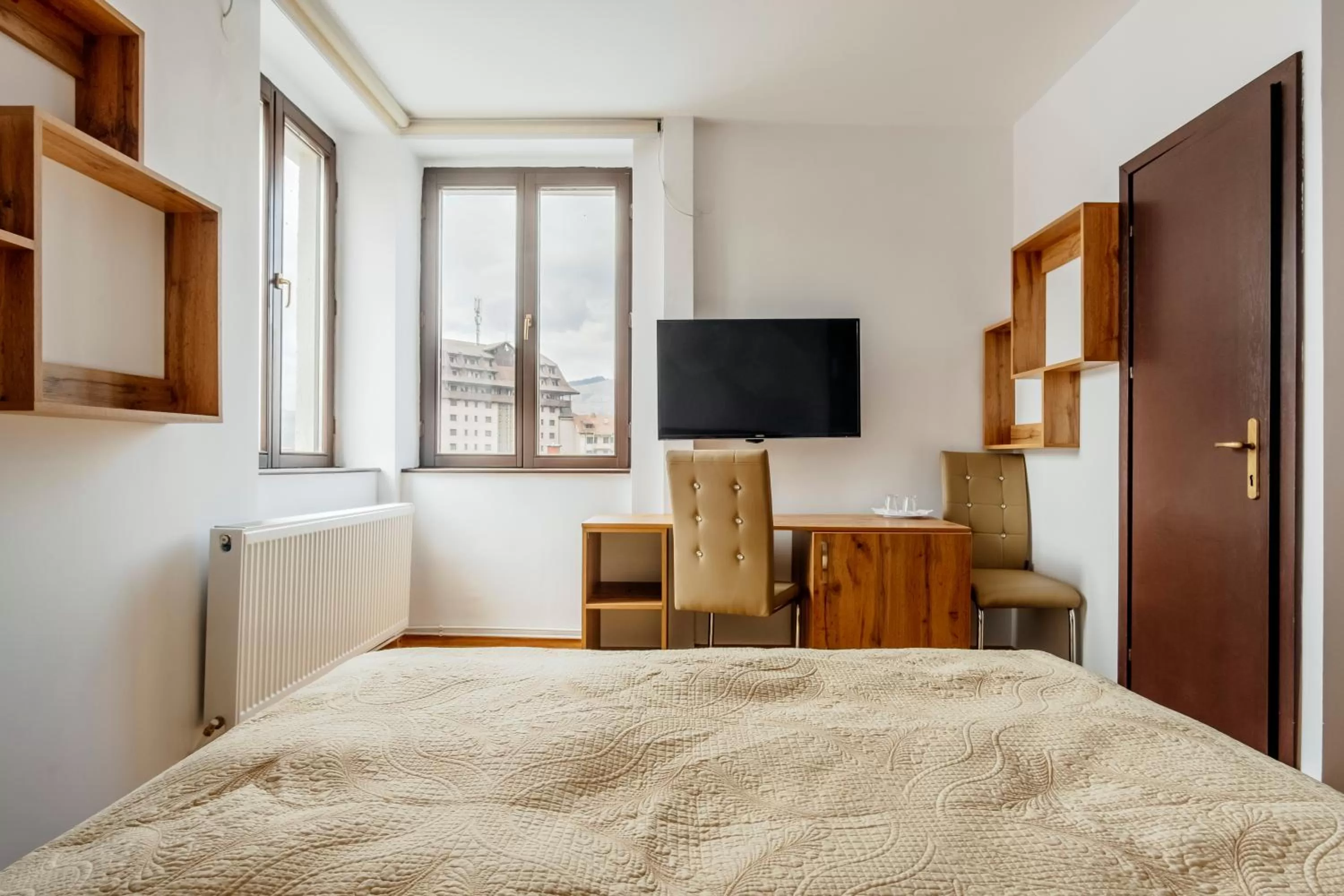 Bed in Hotel Carpati