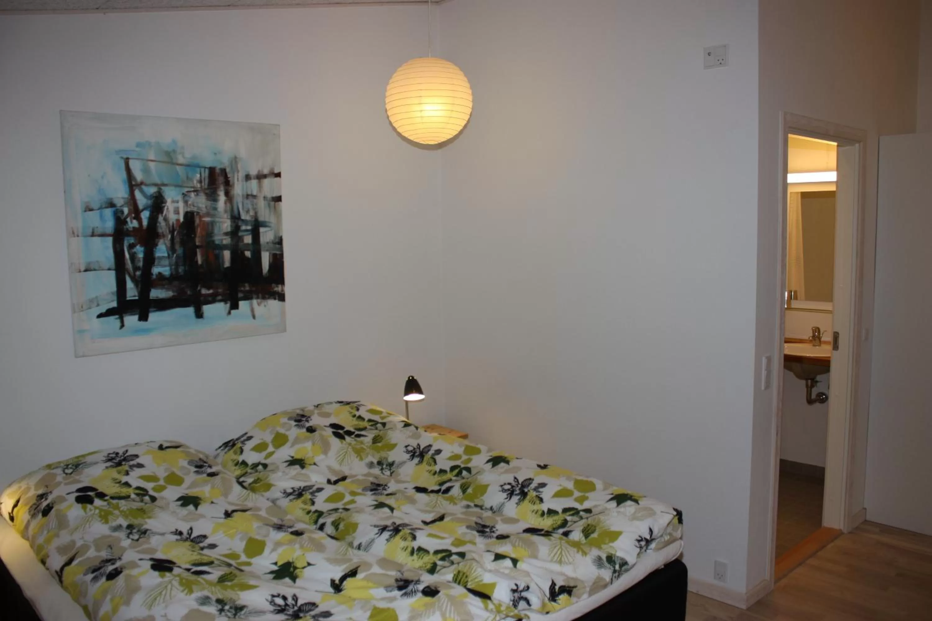 Bed in Holmehuset Bed & Breakfast