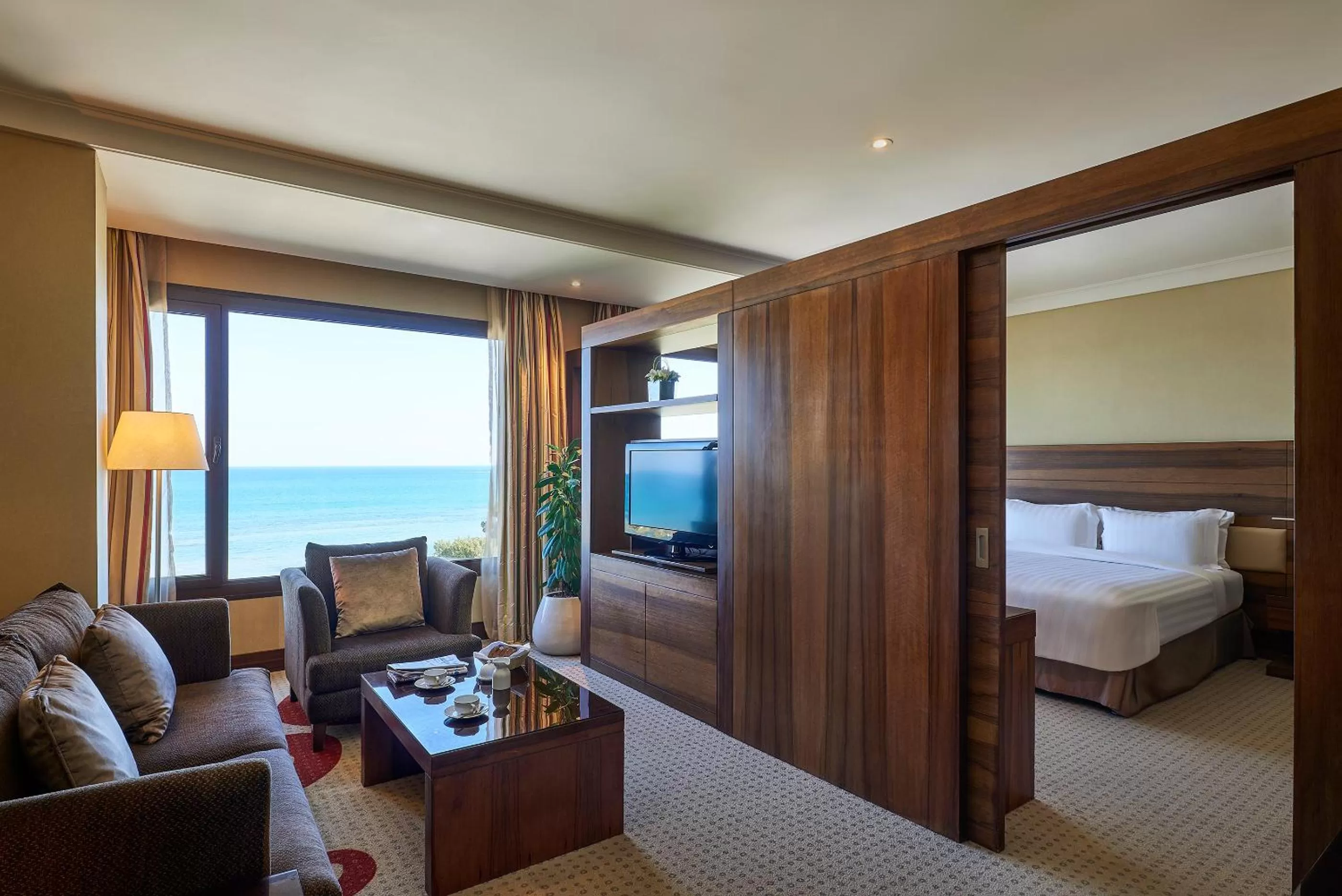 Seating area, Bed in Safir Fintas Hotel Kuwait