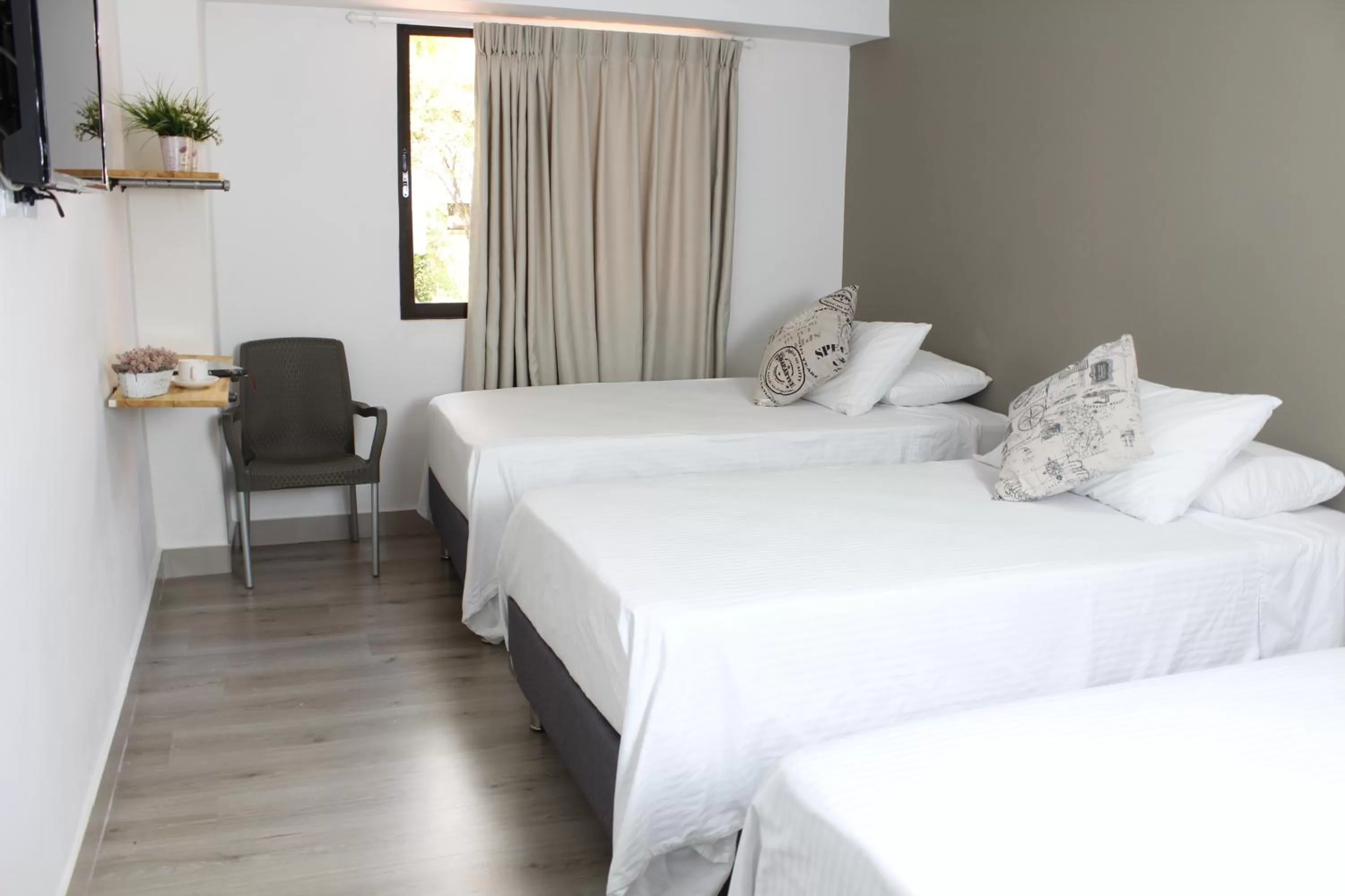 Bed in Hotel Boutique Plaza