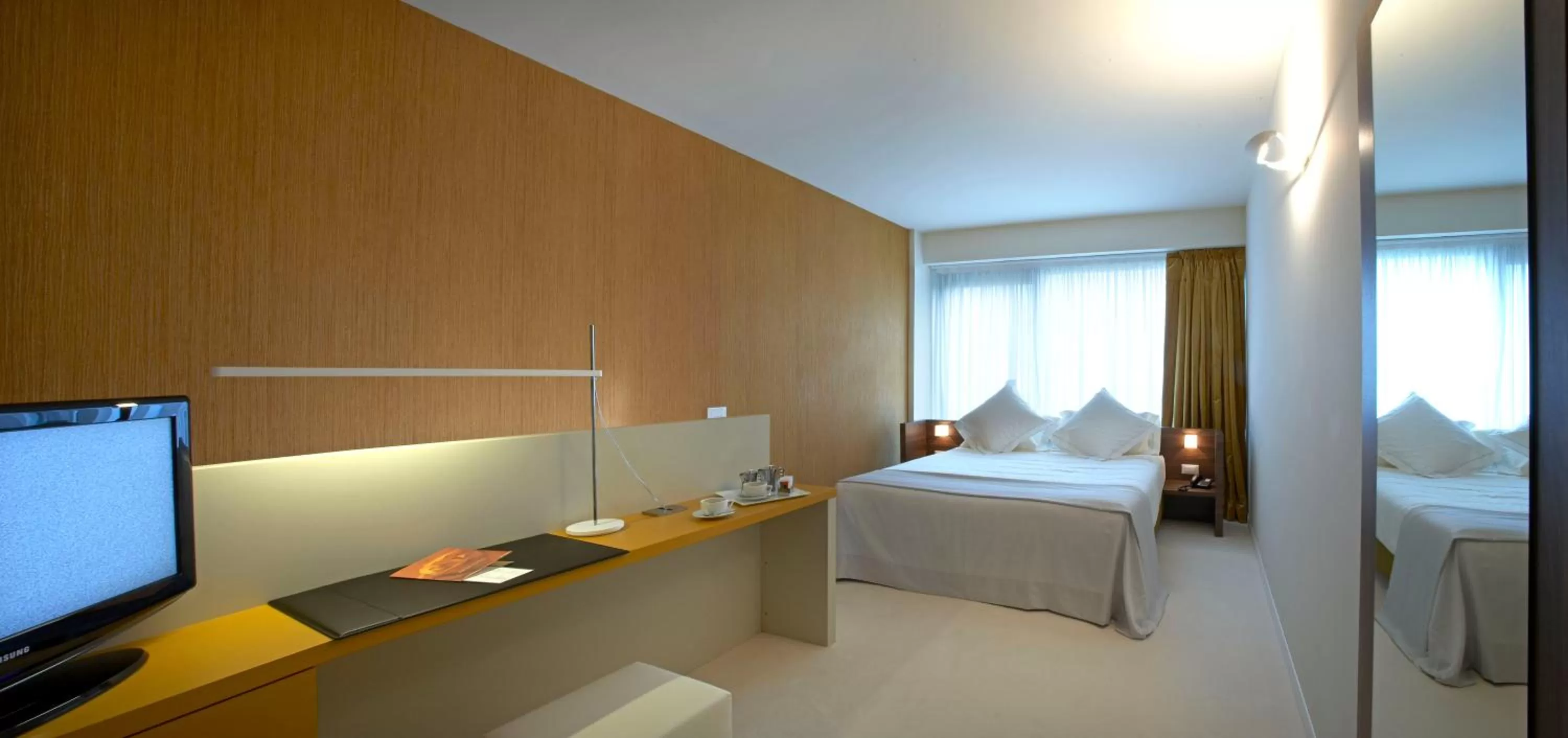Bed in Devero Hotel & Spa, BW Signature Collection