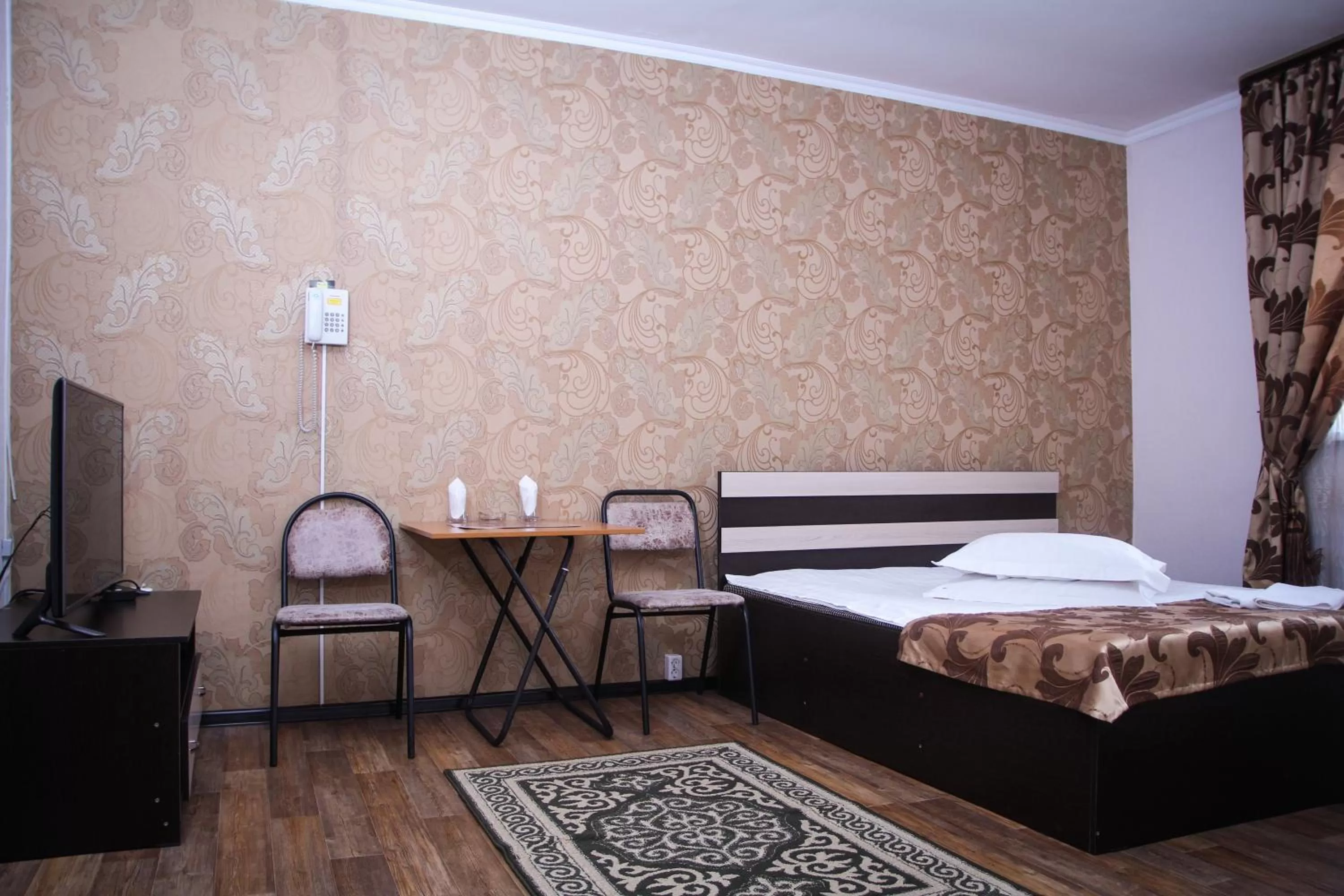 Decorative detail, Bed in Astina Hotel