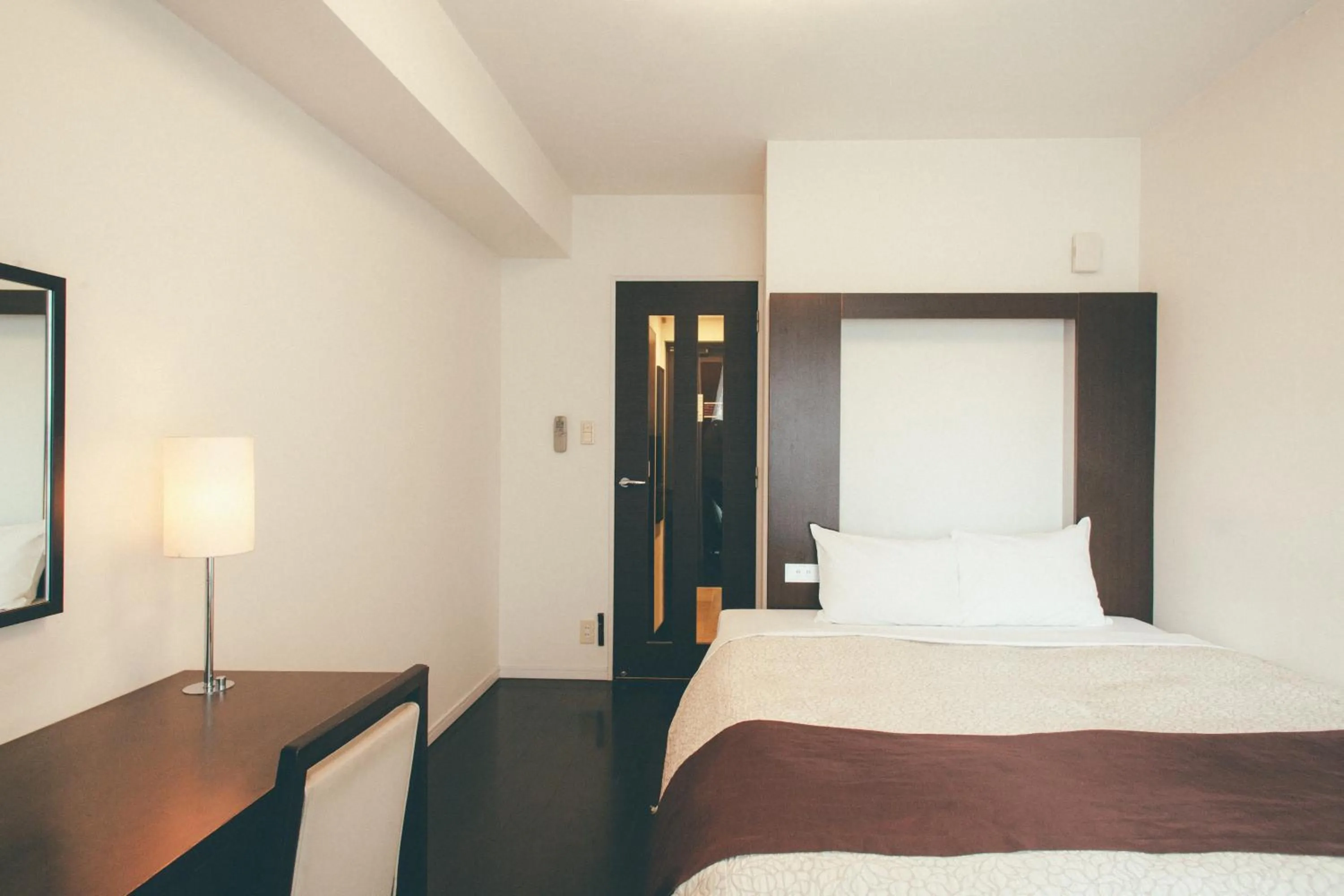 Bed in Kuretake Inn Premium Hamamatsucho