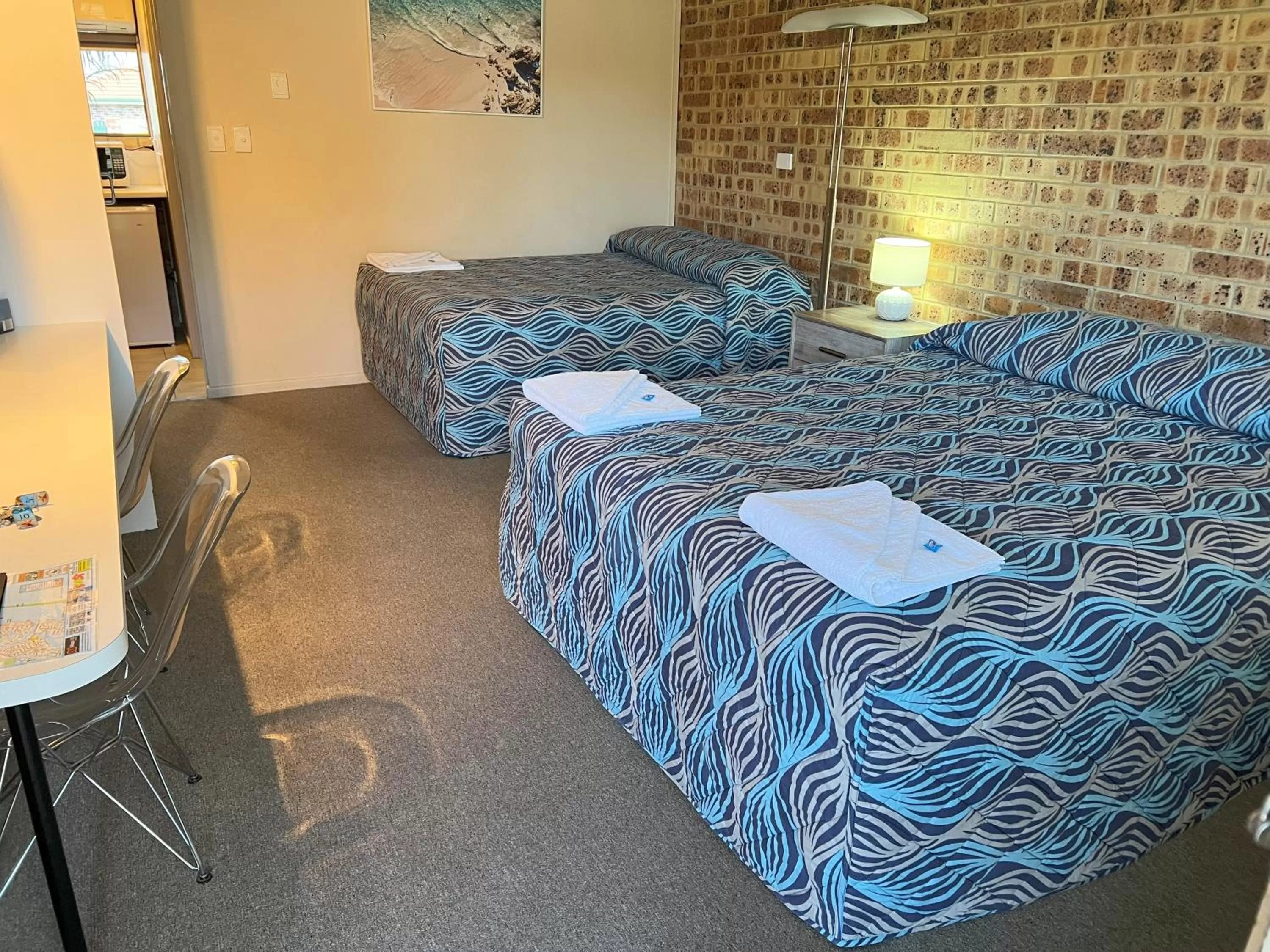 Bed in Golden Beach Motor Inn, Caloundra