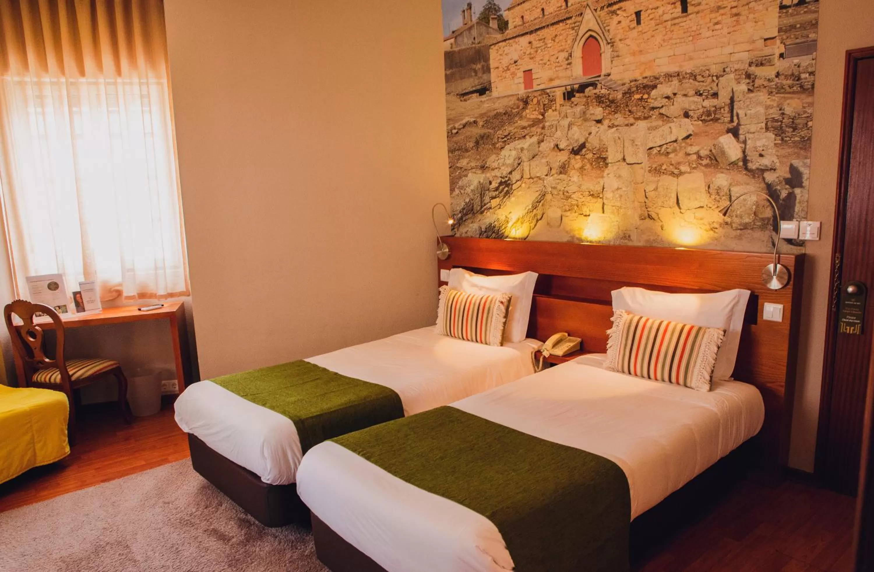 Bed in Hotel Império do Rei