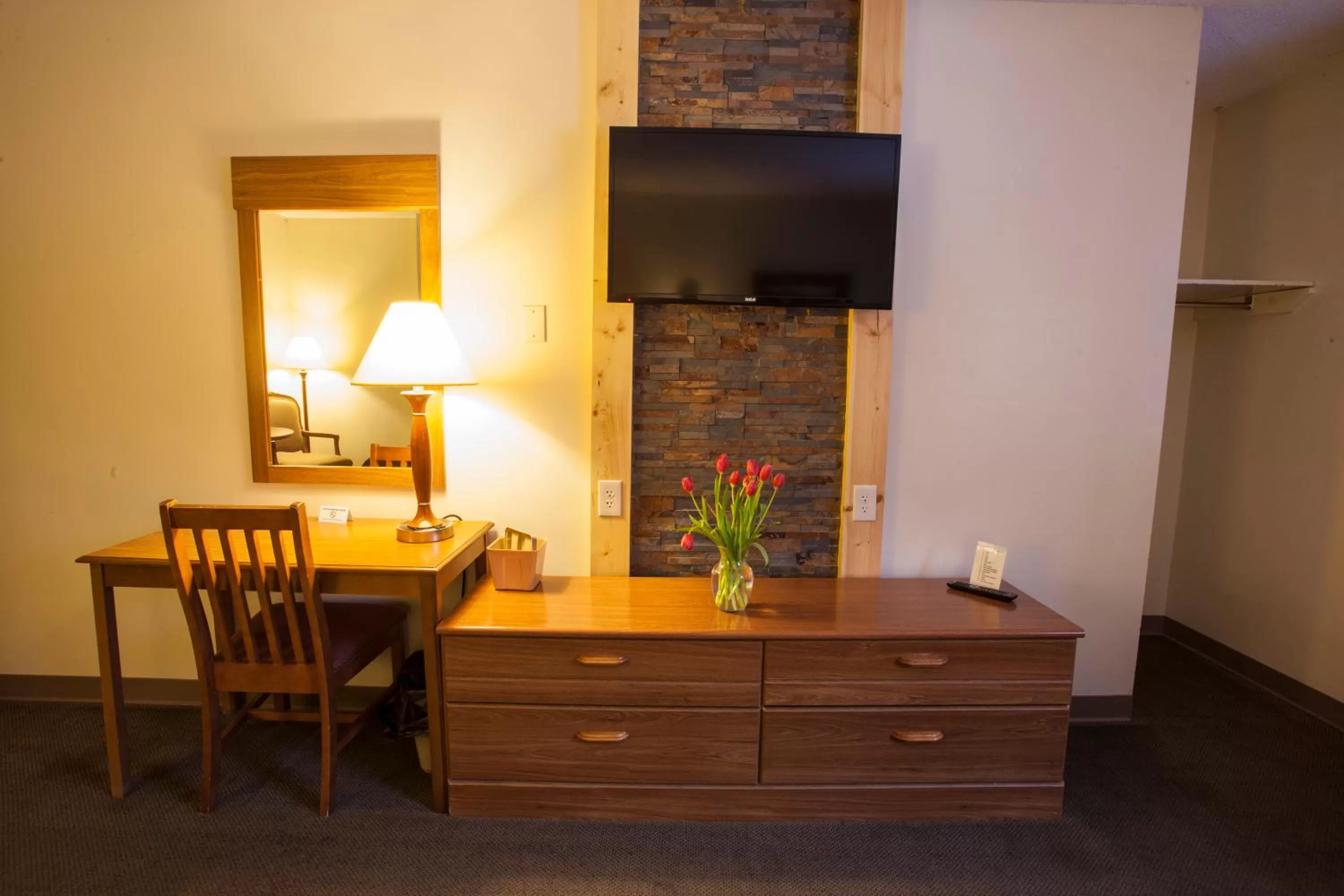 Decorative detail, TV/Entertainment Center in Caberfae Peaks Ski & Golf Resort