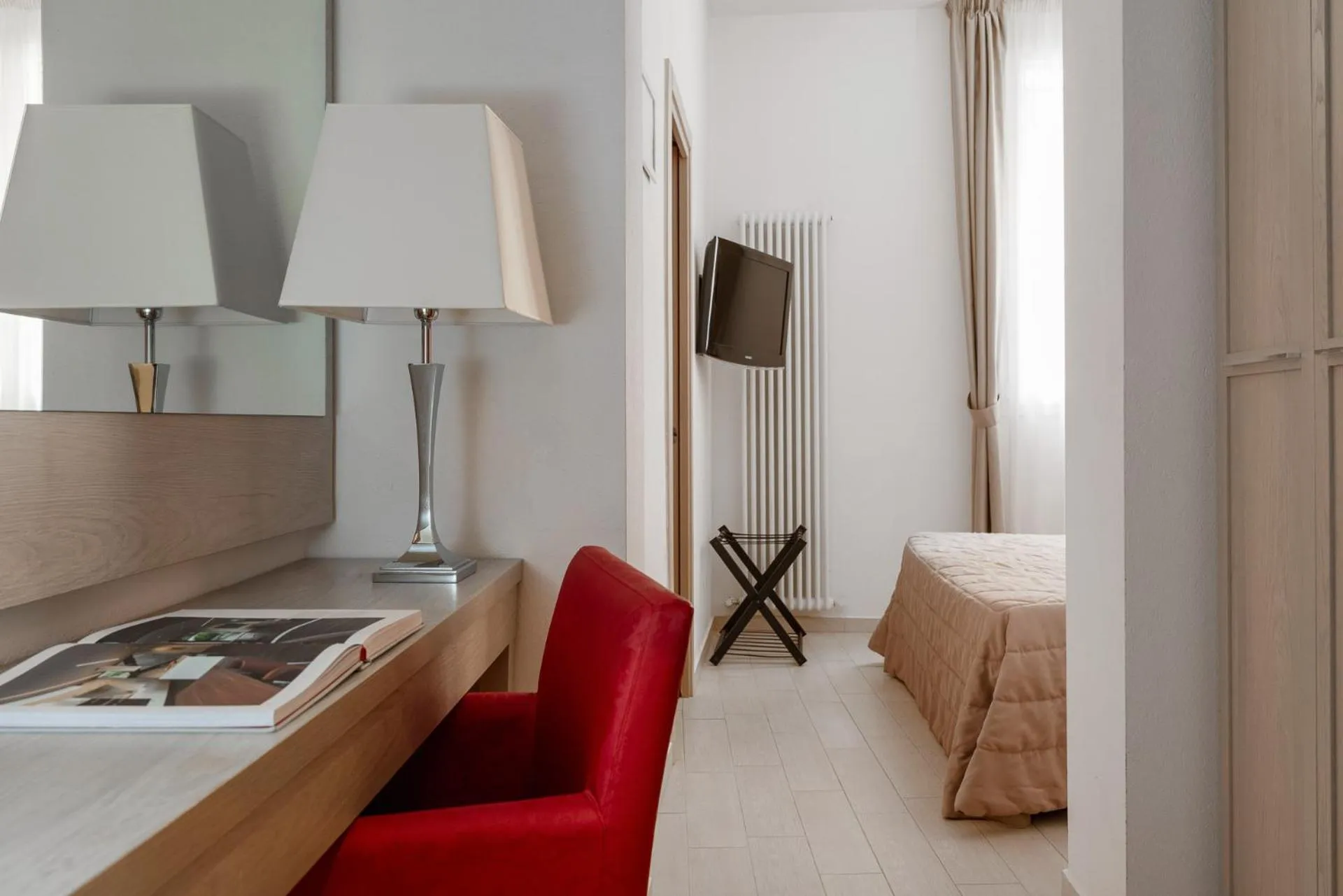 Bedroom in Albergo Rossini 1936 Small & Charming