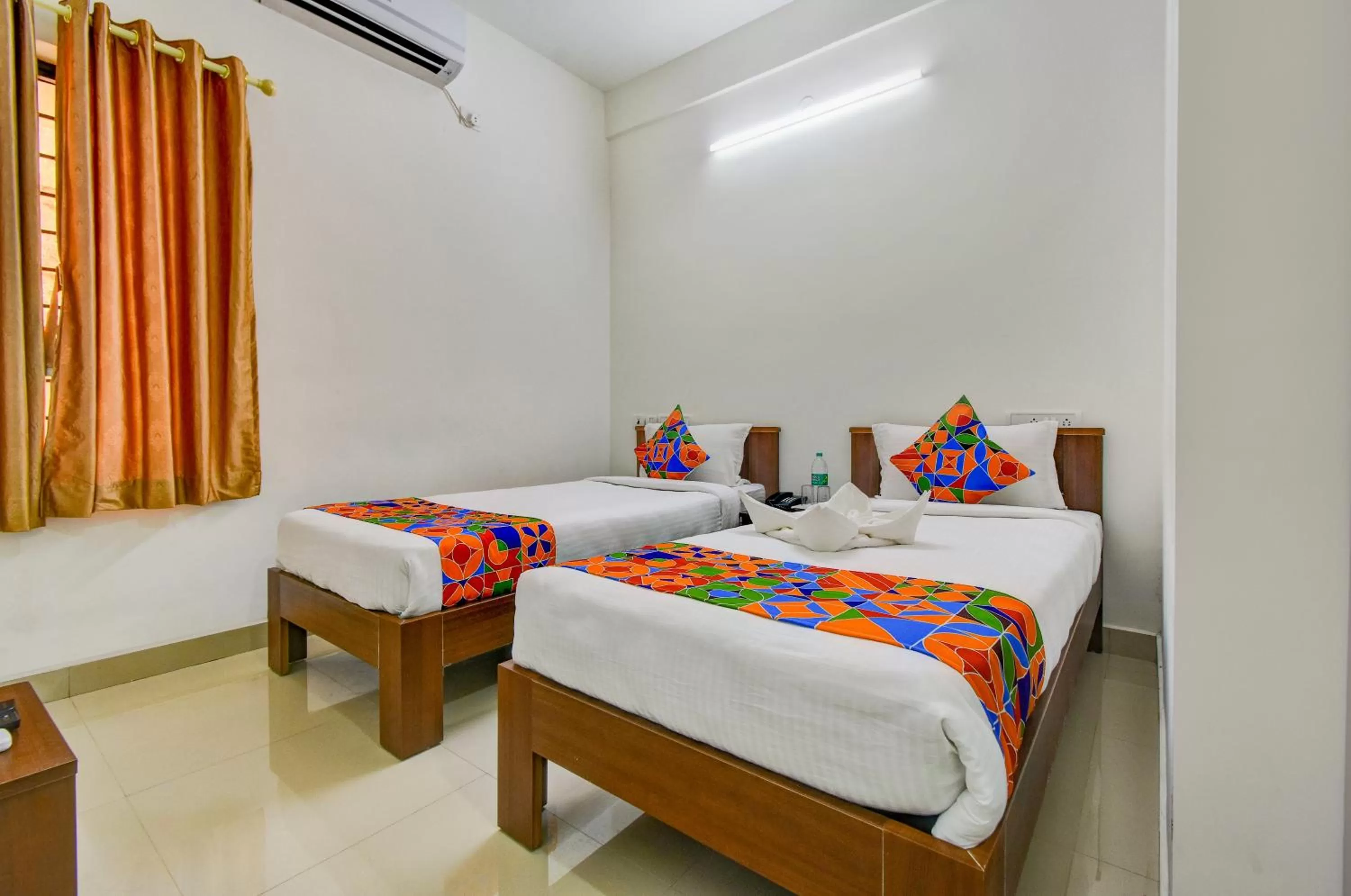 Bed in FabHotel PAS Residency - Nr Marina Beach