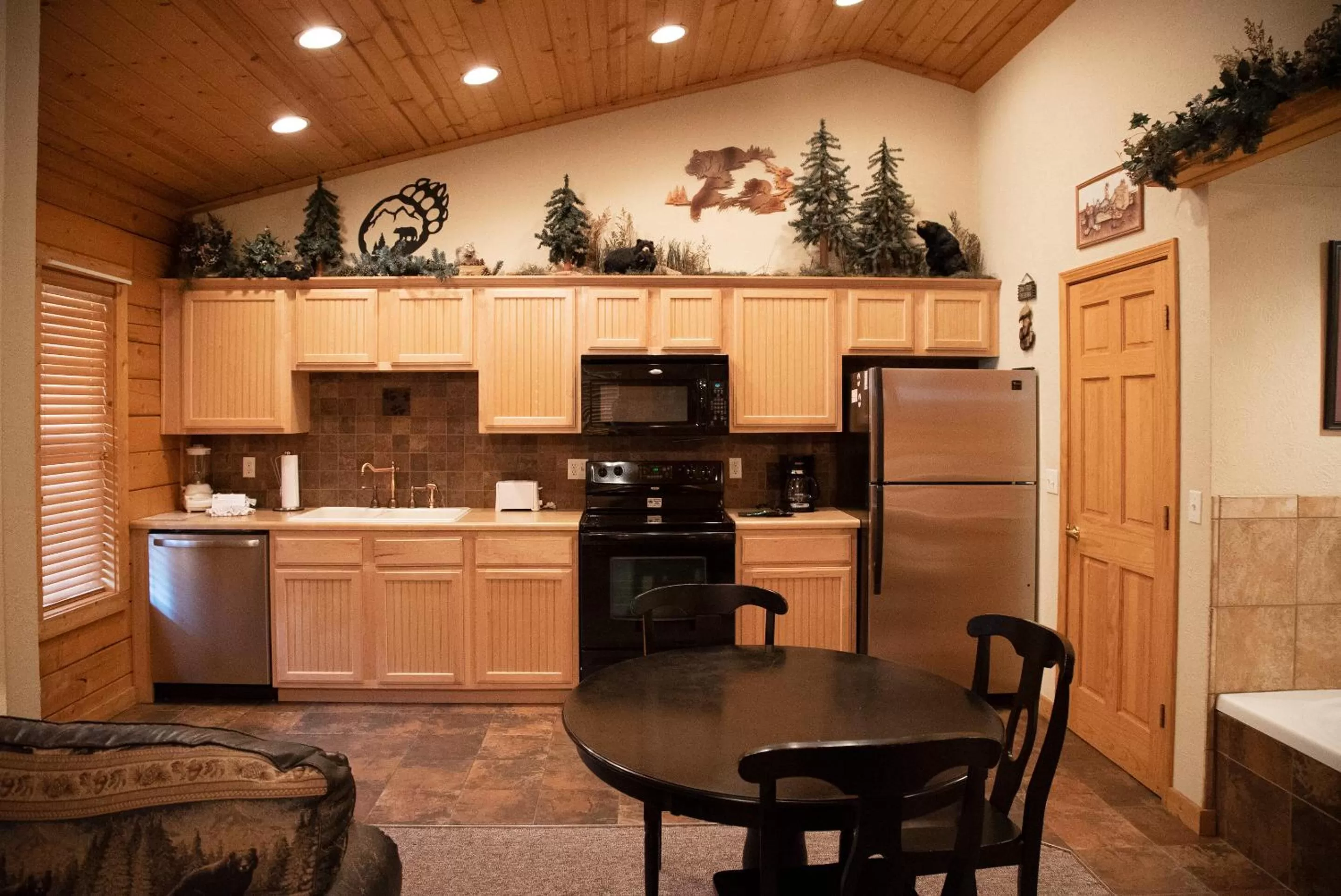 Kitchen or kitchenette in Cabins at Grand Mountain