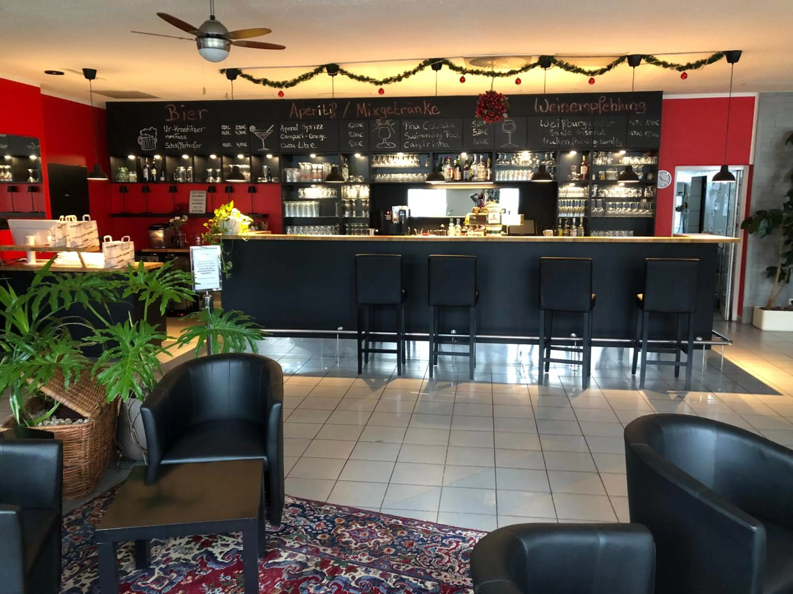 Lounge or bar in astral'Inn Leipzig Hotel & Restaurant