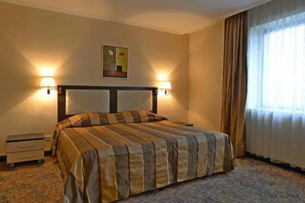 Bed in Merian Palace Hotel