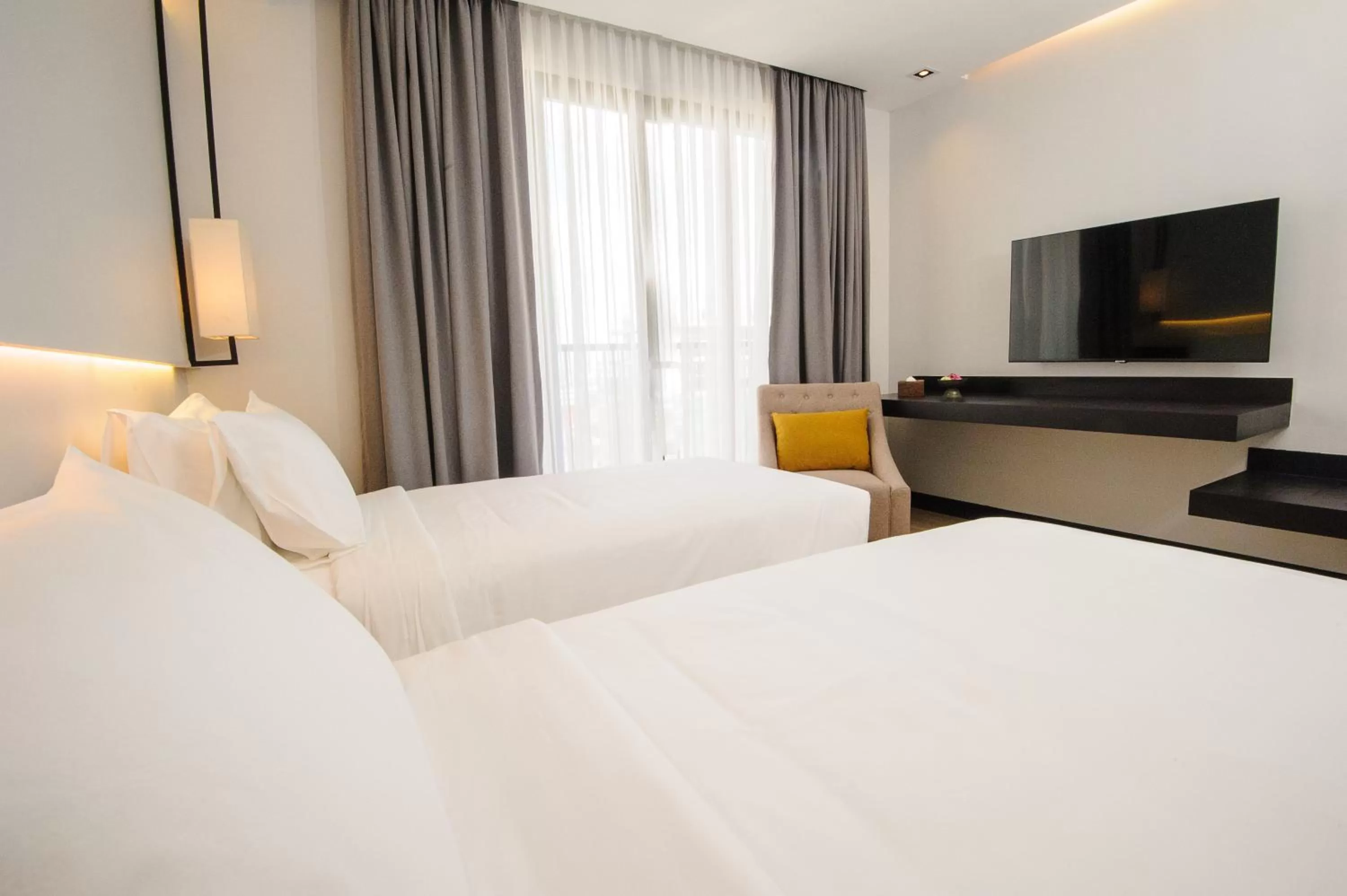 Bed in GLOW PARK HOTEL Grand Royal Palace