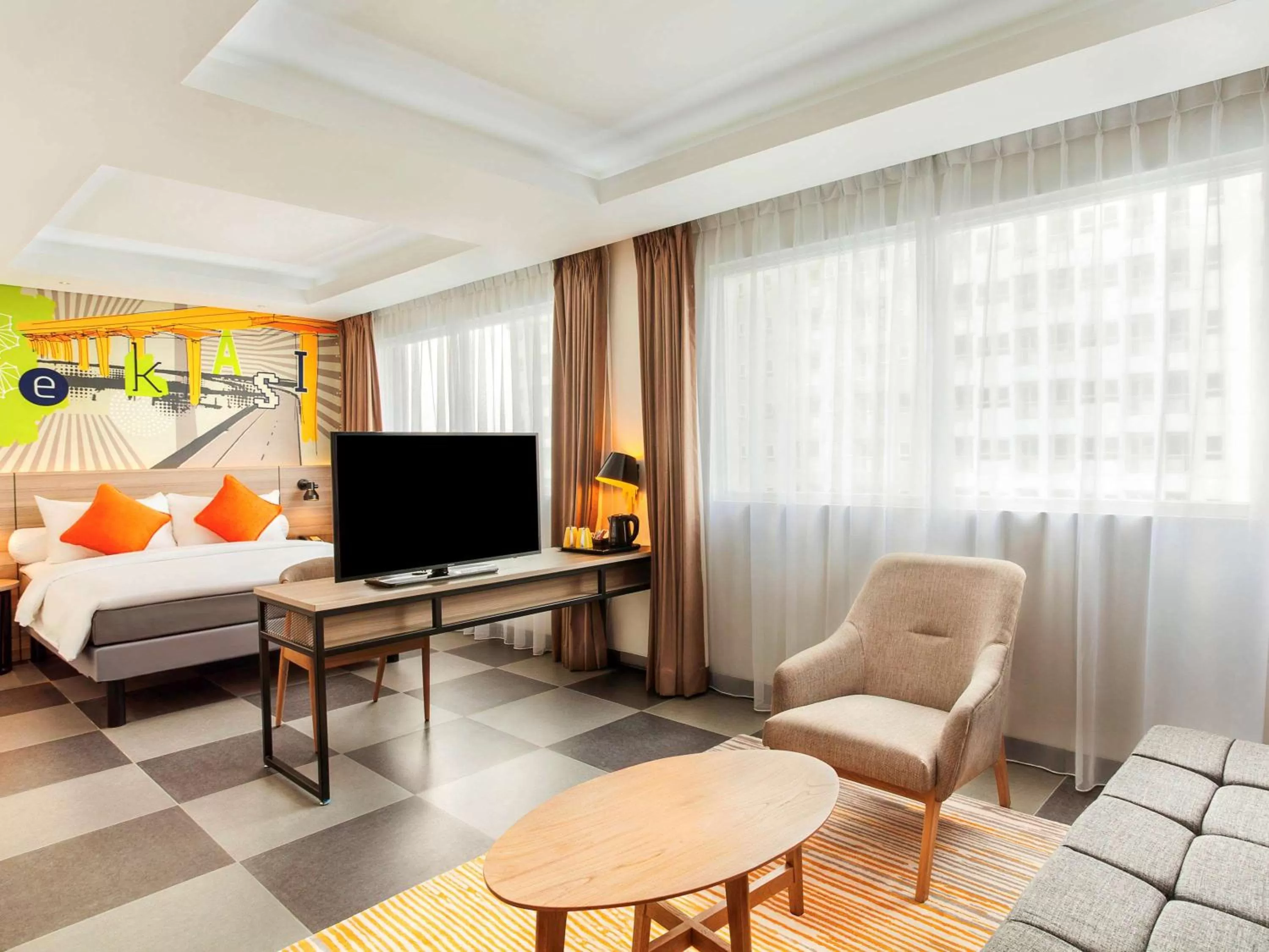 Deluxe Queen Room with Sofa in ibis Styles Bekasi Jatibening