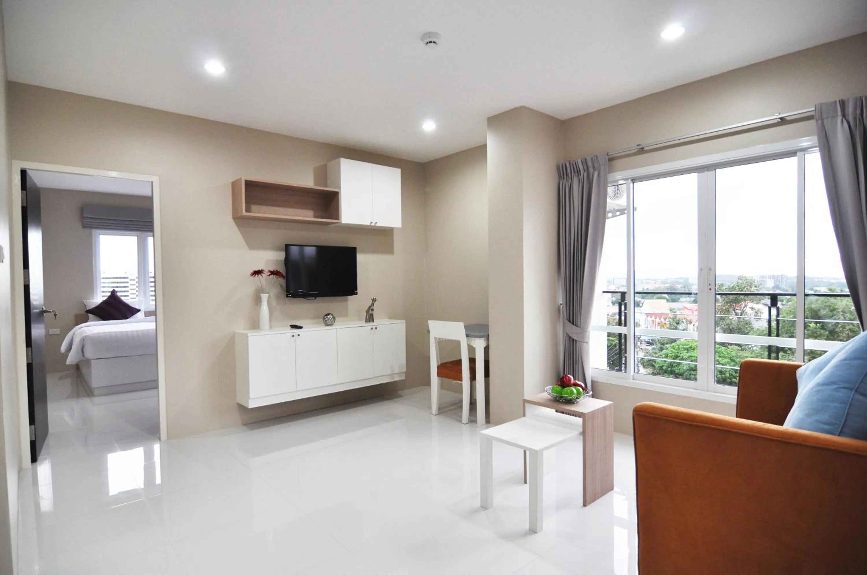 Communal lounge/ TV room, Bed in Khao Rang Place