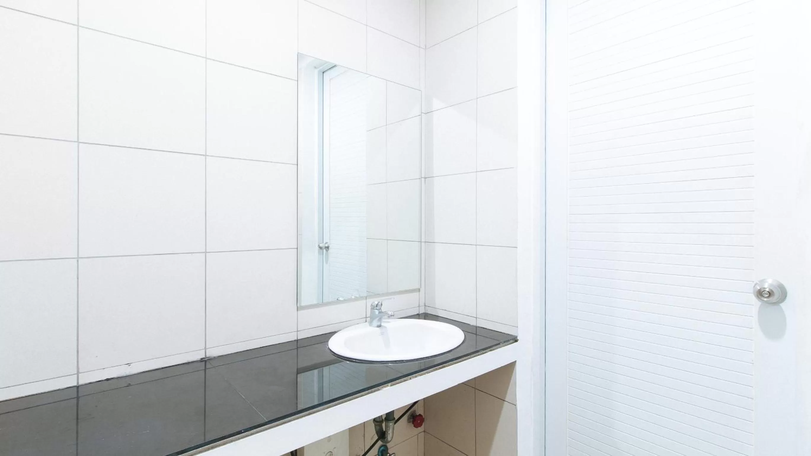 Bathroom in Sans Hotel Laperal Manila