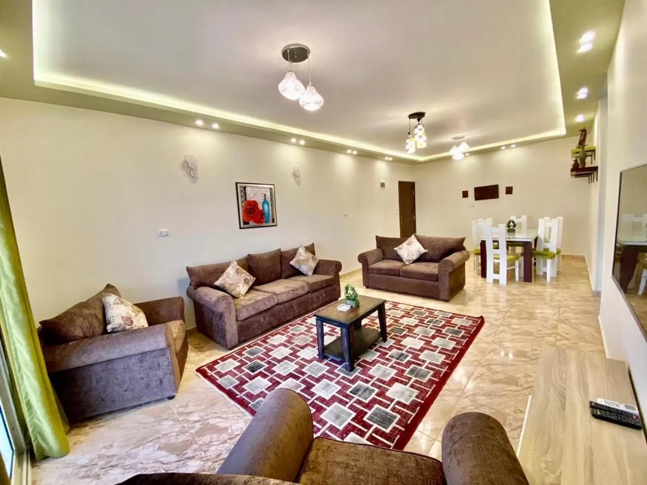 TV and multimedia, Seating Area in Charbel apartments